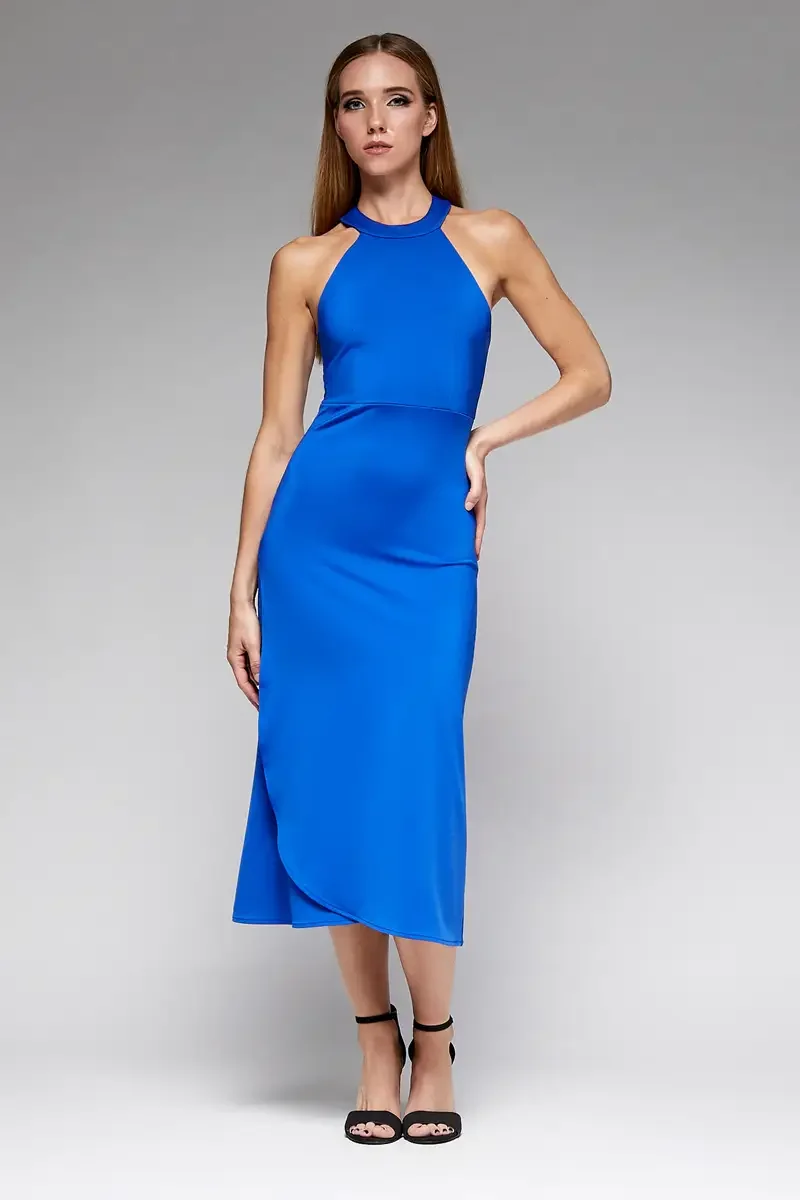 Minika Ko lookbook, cobalt blue halter midi dress, front view, high halter neckline, horizontal seam at waist, asymmetric wrap skirt with curved overlap hem, smooth synthetic fabric, photographed by Scott Parker Photo