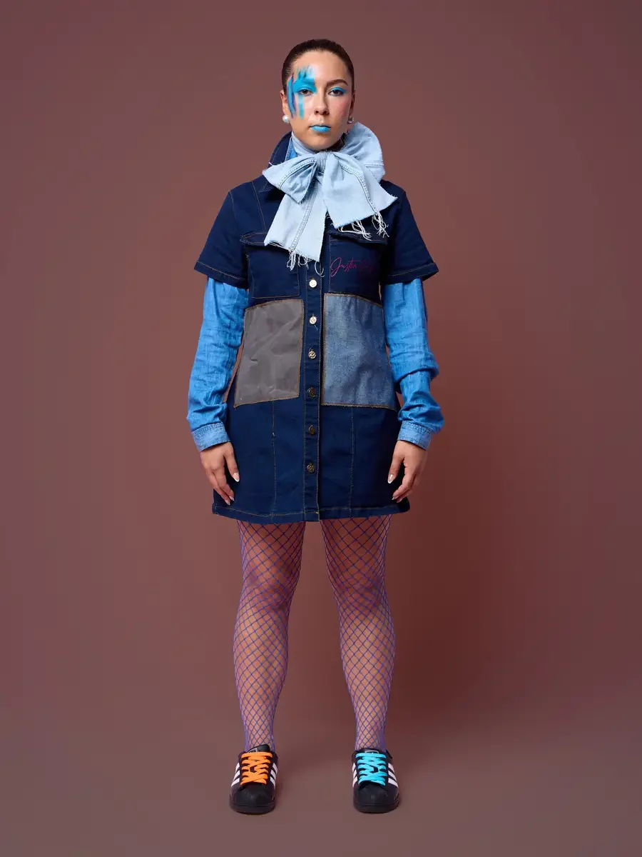 Denim shirt dress with collar bow and fishnet tights, hands on hips, JUS10H Court Show lookbook