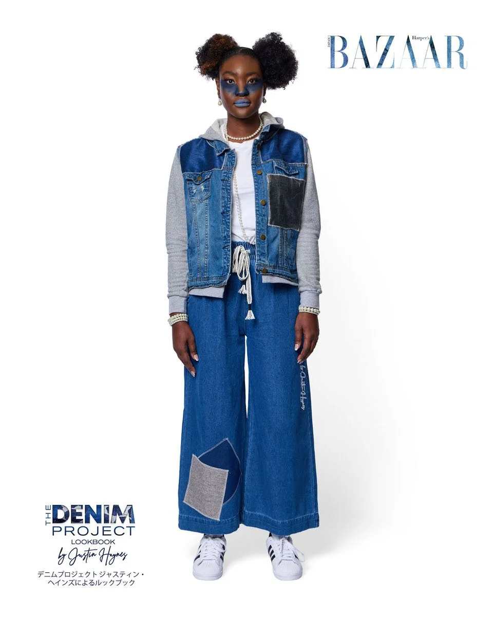 

JUS10H Denim Project 2025 Harper's Bazaar Japan lookbook — model in medium-wash denim trucker vest with grey hoodie sleeves, charcoal patchwork chest pocket, over wide-leg dark indigo drawstring denim trousers with grey flannel patch and JUS10H scr