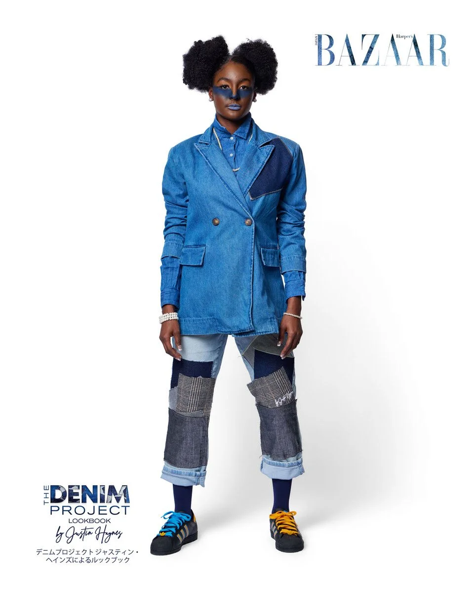 JUS10H Denim Project 2025 Harper's Bazaar Japan lookbook — model in medium-wash double-breasted denim blazer with contrast dark indigo shoulder panel over multi-wash patchwork cropped jeans with plaid and grey flannel insets, mismatched Adidas sneake