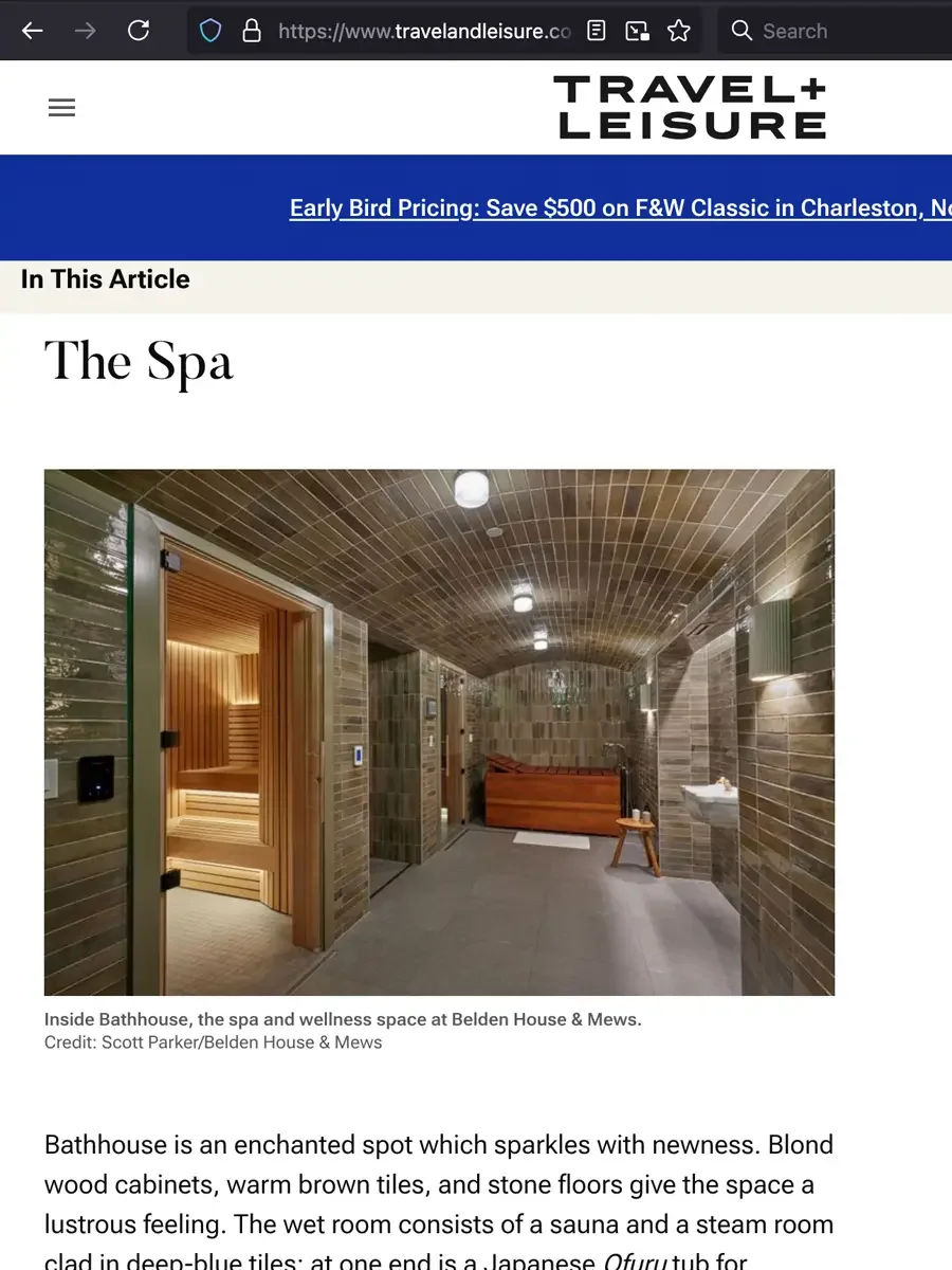 Belden House and Mews Bathhouse spa corridor, Litchfield Connecticut, vaulted tile ceiling with sauna entrance and soaking tub, photography credit Scott Parker and Belden House and Mews, featured in Travel and Leisure June 2025