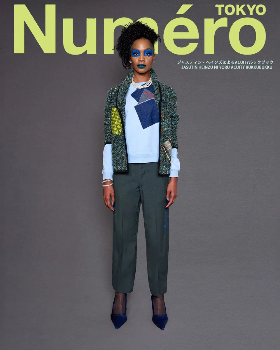 JUS10H by Justin Haynes ACUITY Collection lookbook for Numéro Tokyo by Scott Parker — model in green tweed cropped jacket with denim and tartan patchwork pockets, layered over light blue sweatshirt with patchwork detail, pearl necklace, dark green ta