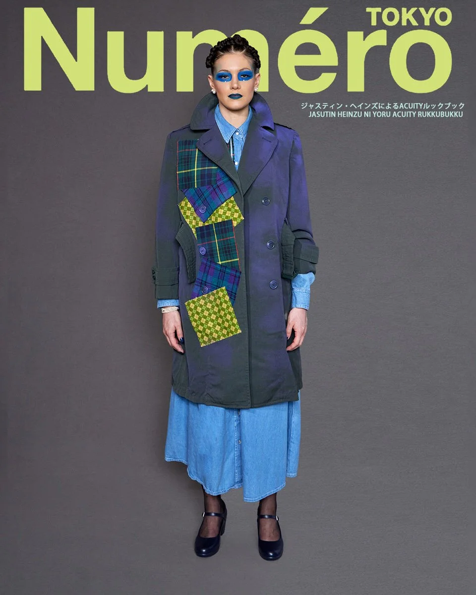 JUS10H by Justin Haynes ACUITY Collection lookbook for Numéro Tokyo by Scott Parker — model in slate gray and purple ombré double-breasted trench coat with multi-tartan and checkered patchwork panels, layered over chambray button-down and light wash 