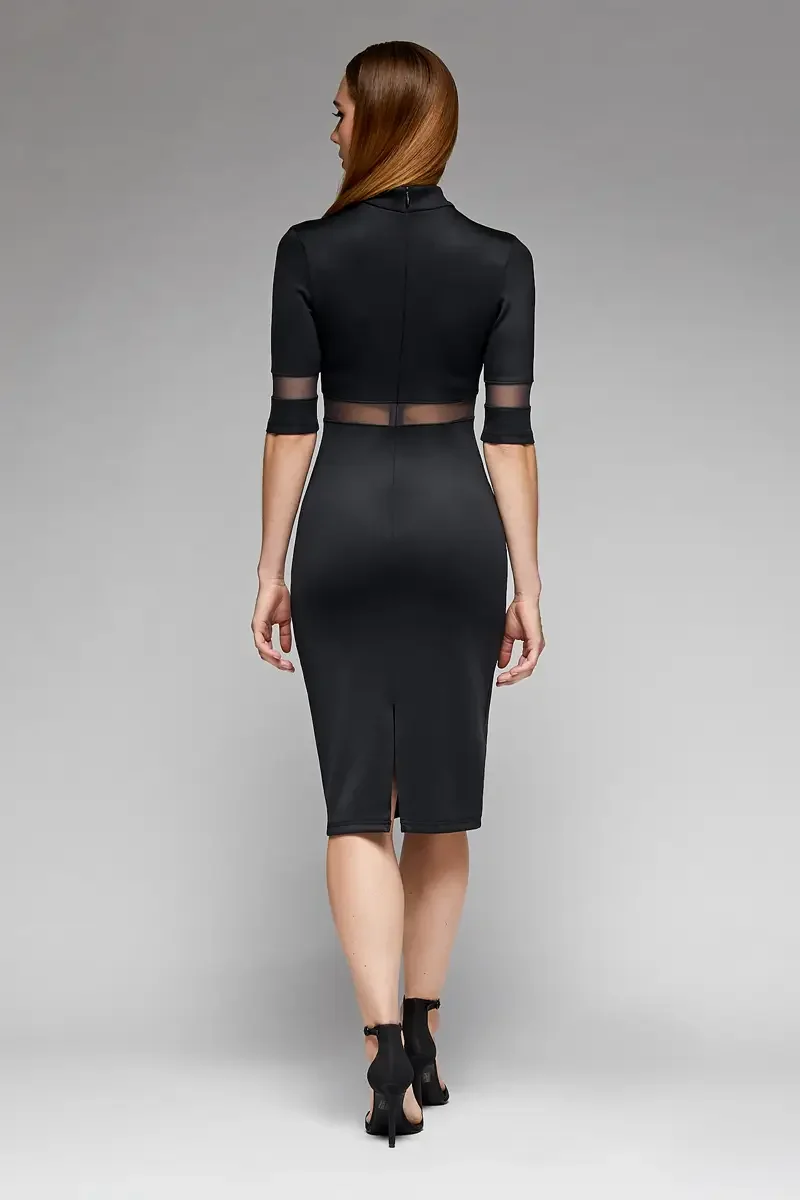 Minika Ko lookbook, black mock-neck midi dress, back view, elbow-length sleeves, sheer mesh band at waist, mesh cuff at sleeve hem, center back slit at hem, photographed by Scott Parker Photo