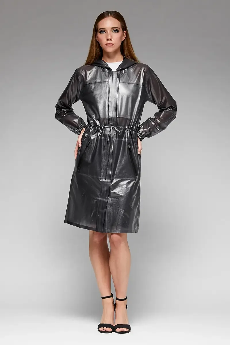 Minika Ko lookbook, gunmetal metallic raincoat, front view, hooded, center front zip, drawstring waist, elasticated cuffs, high-gloss coated fabric, knee length, photographed by Scott Parker Photo
