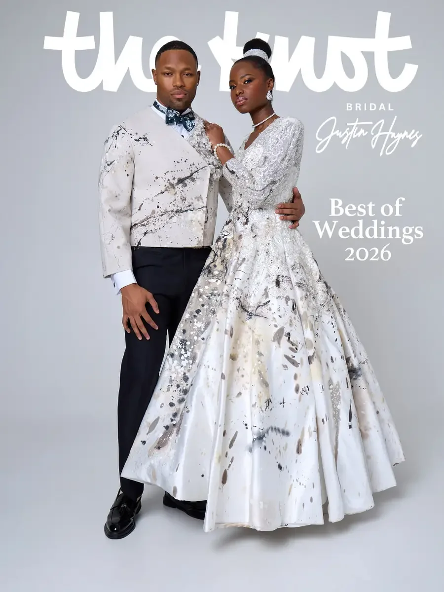 JUS10H 2025 The Knot Bridal feature, Justin Haynes Best of Weddings 2026 cover, ivory abstract paint-splatter ball gown with long sleeves and V-neckline alongside matching splatter-print tuxedo jacket with dark teal bow tie, photographed by Scott Par