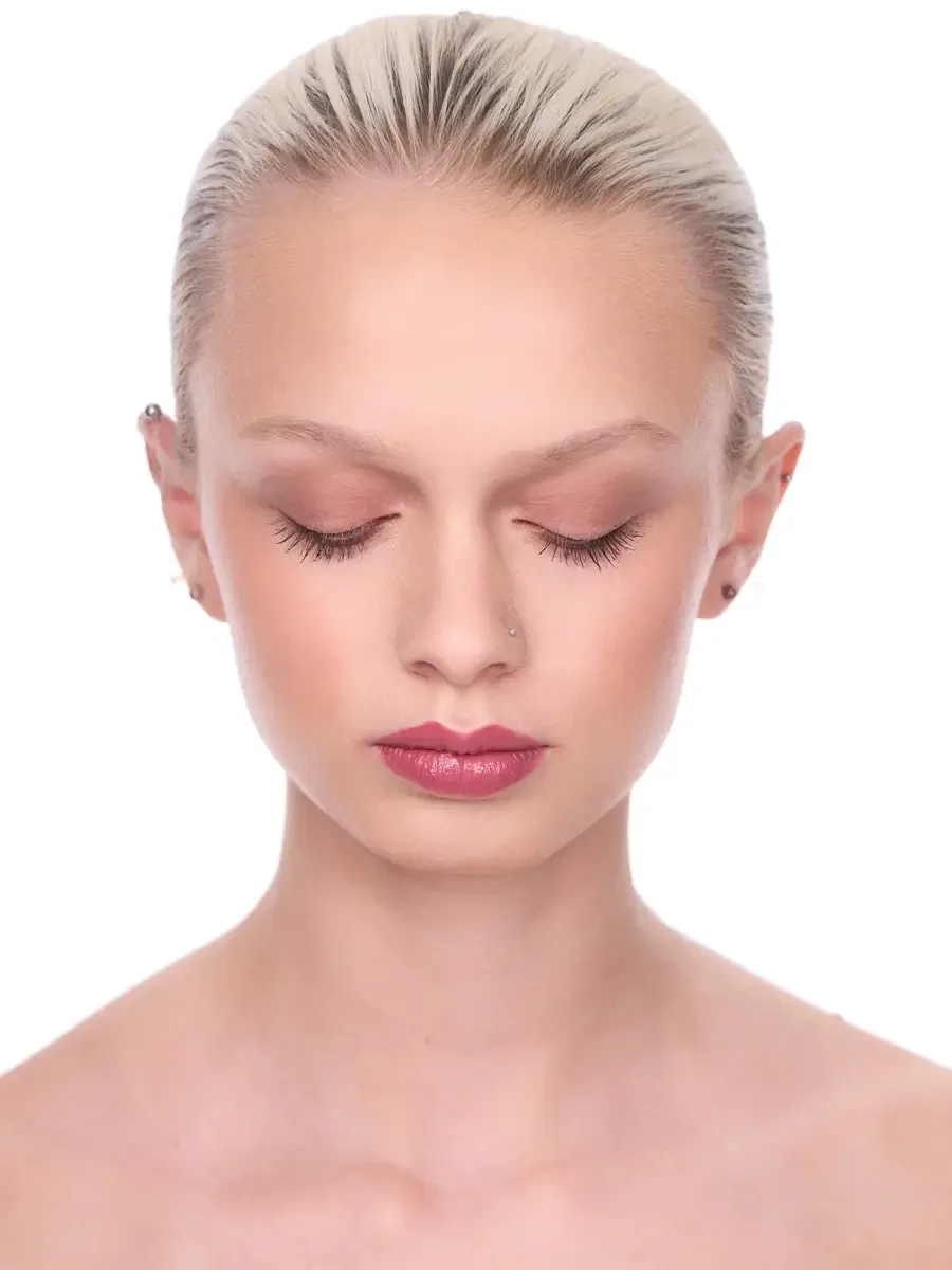 Model portfolio development session, beauty, close-crop, hair slicked back, eyes closed, rose lip, soft eye, bare shoulders, white background, photographed by Scott Parker Photo, New York