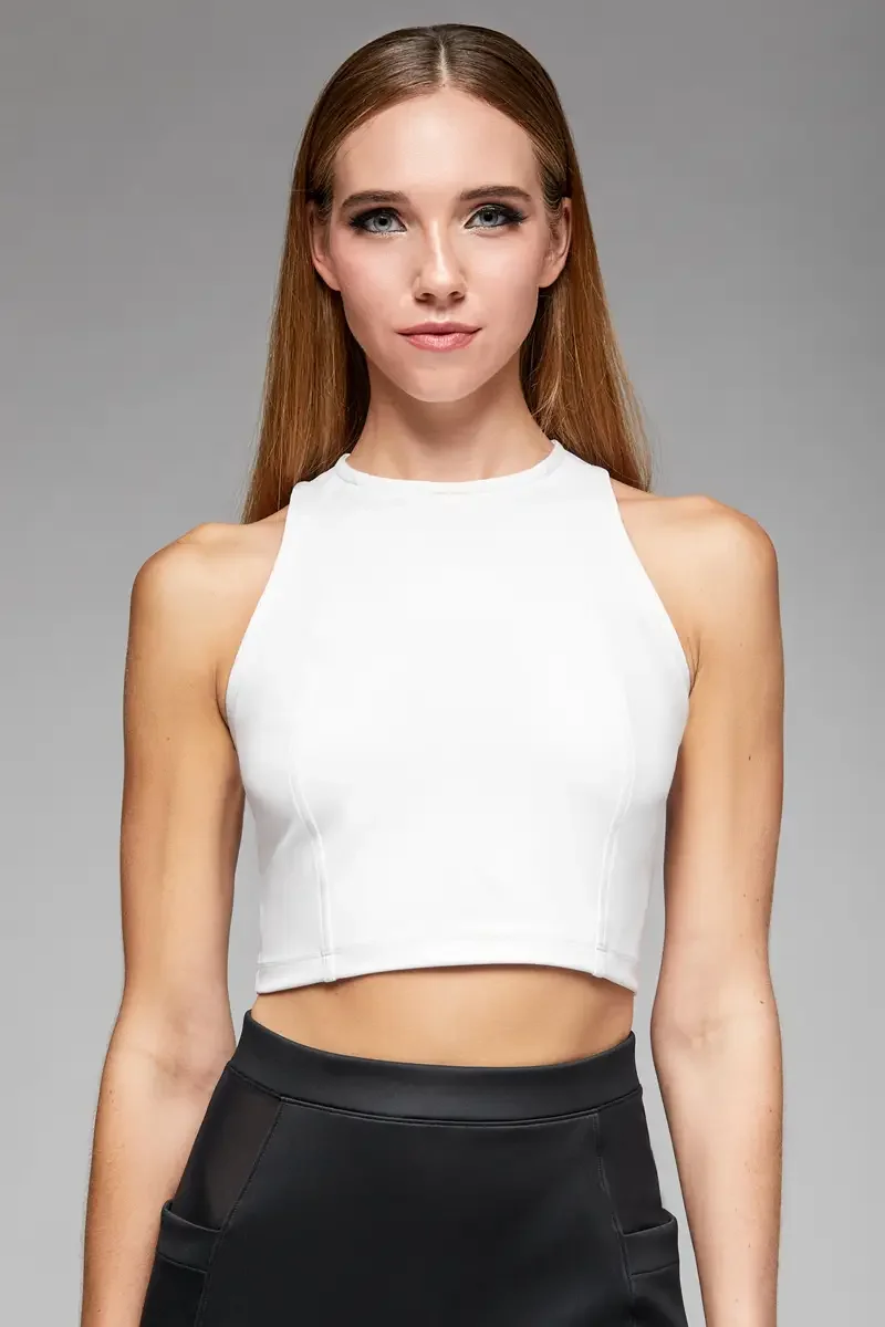 Minika Ko lookbook, detail, white halter crop top, close crop showing high halter neckline, racerback silhouette, and seam construction at front bodice, photographed by Scott Parker Photo