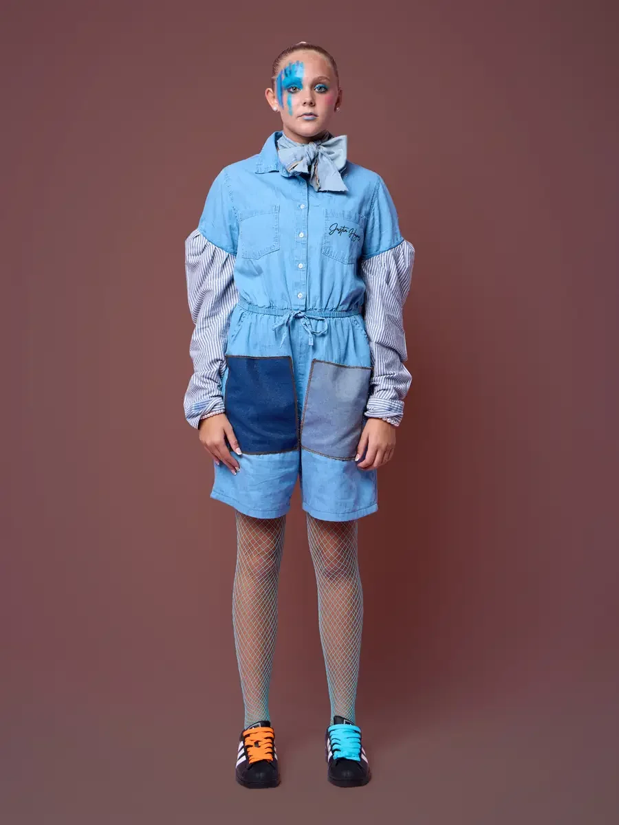 Denim romper with collar bow, contrast patches, and fishnet tights, JUS10H Court Show lookbook