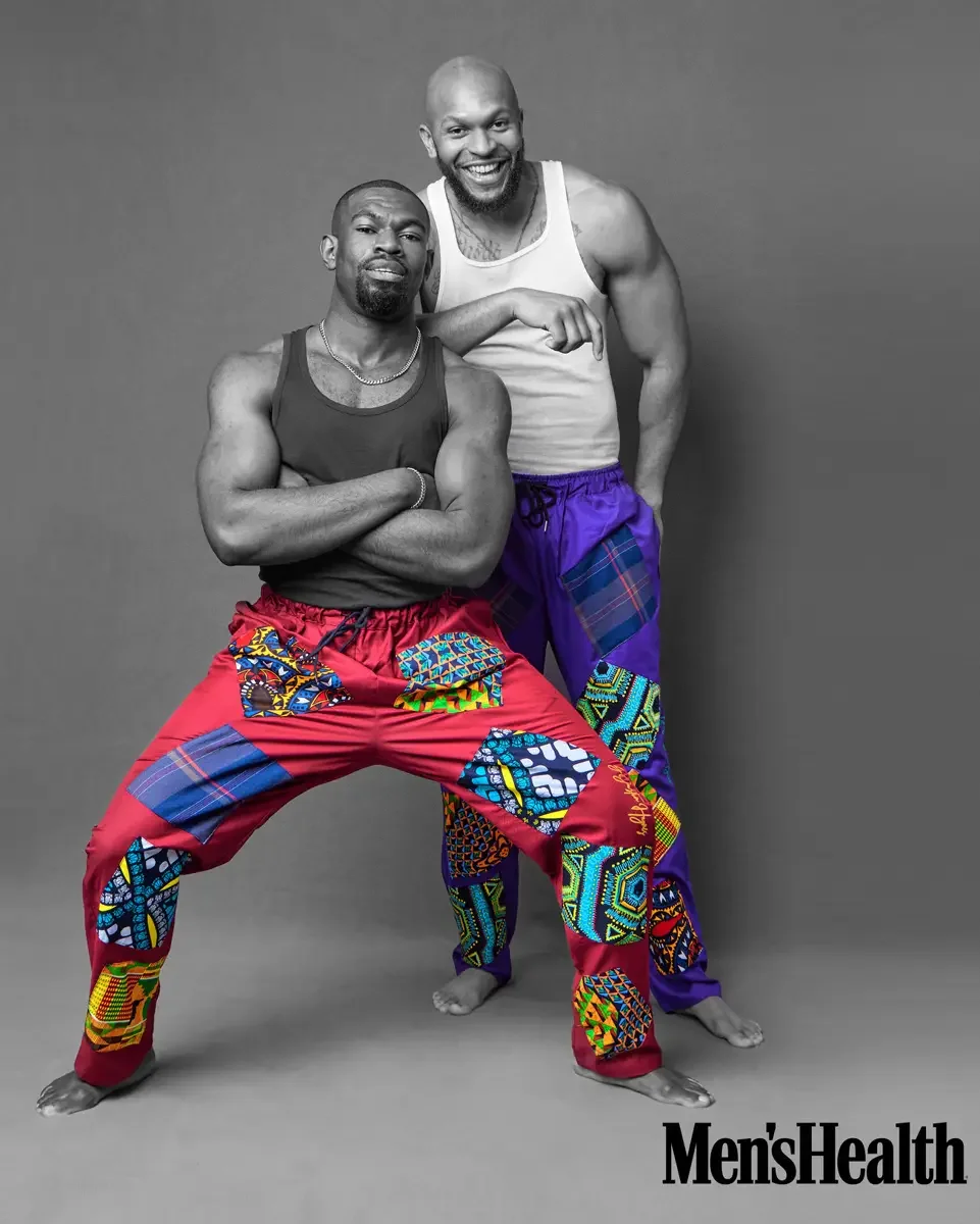 JUS10H 2025 Men's Health feature, two-model editorial, bold patchwork African print trousers in red and purple, black and white photography, photographed by Scott Parker Photo