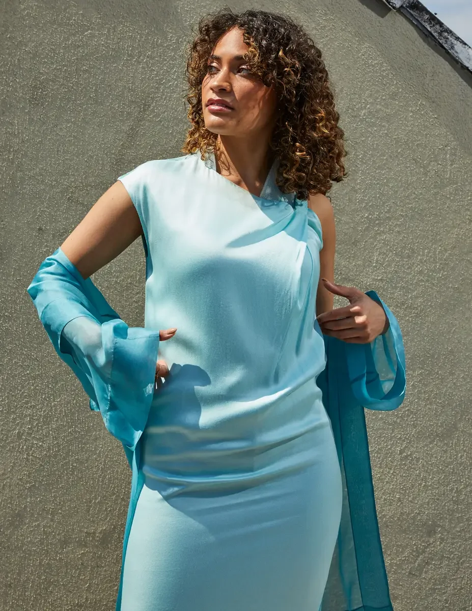 Fashion test shoot, three-quarter, model Ireland T in aqua sleeveless midi dress with turquoise sheer wrap, East Village rooftop, New York City, styling by Matsine Stinson, makeup by Stefani Paige Vivian, photographed by Scott Parker Photo