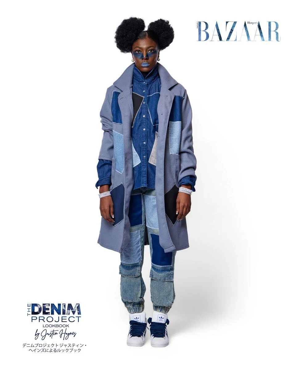 JUS10H Denim Project 2025 Harper's Bazaar Japan lookbook — model in slate blue patchwork trench coat with denim and charcoal geometric panels over a dark indigo button-front denim shirt and mixed-wash patchwork jogger jeans, blue editorial makeup, Ad