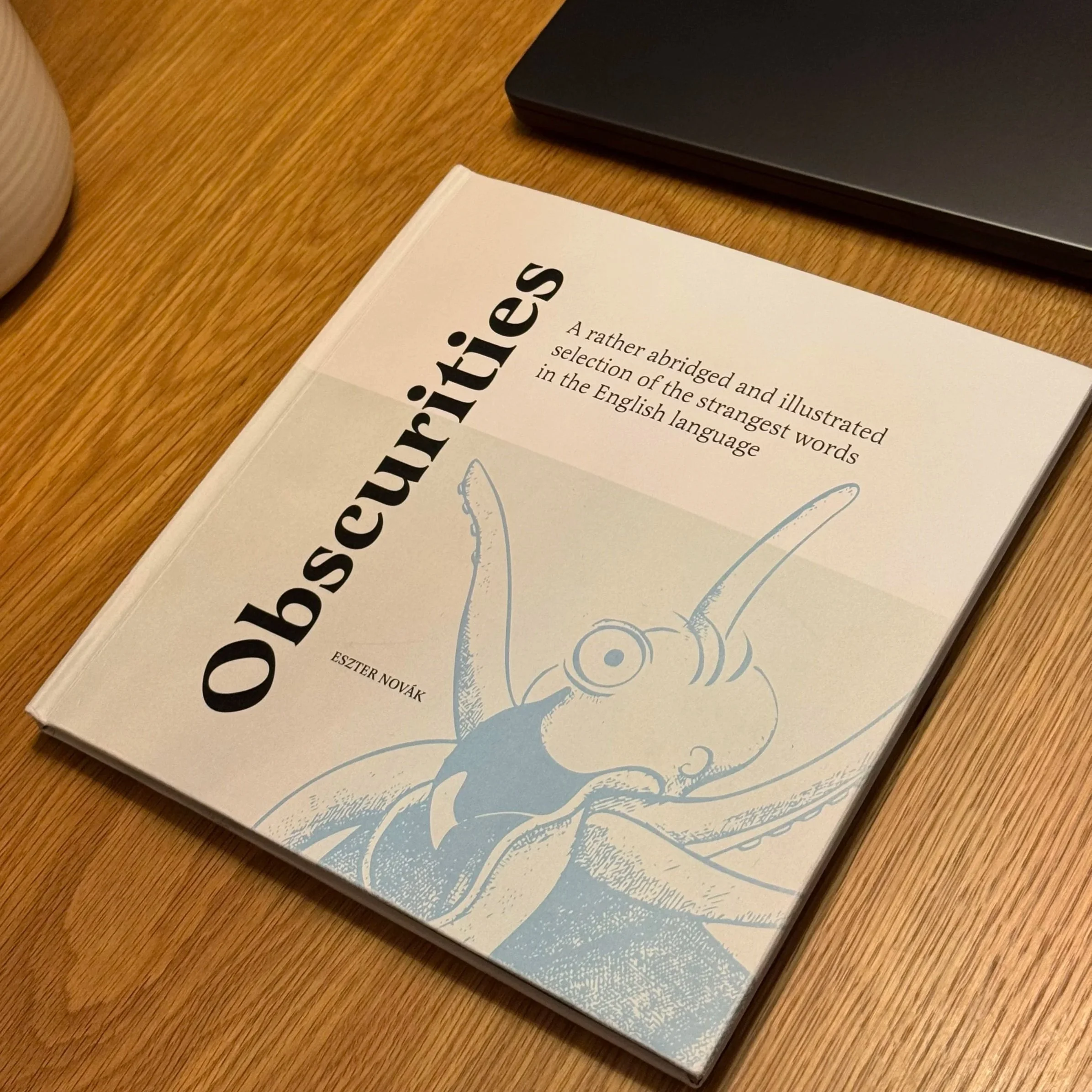 Obscurities book cover with the snollygoster mascot