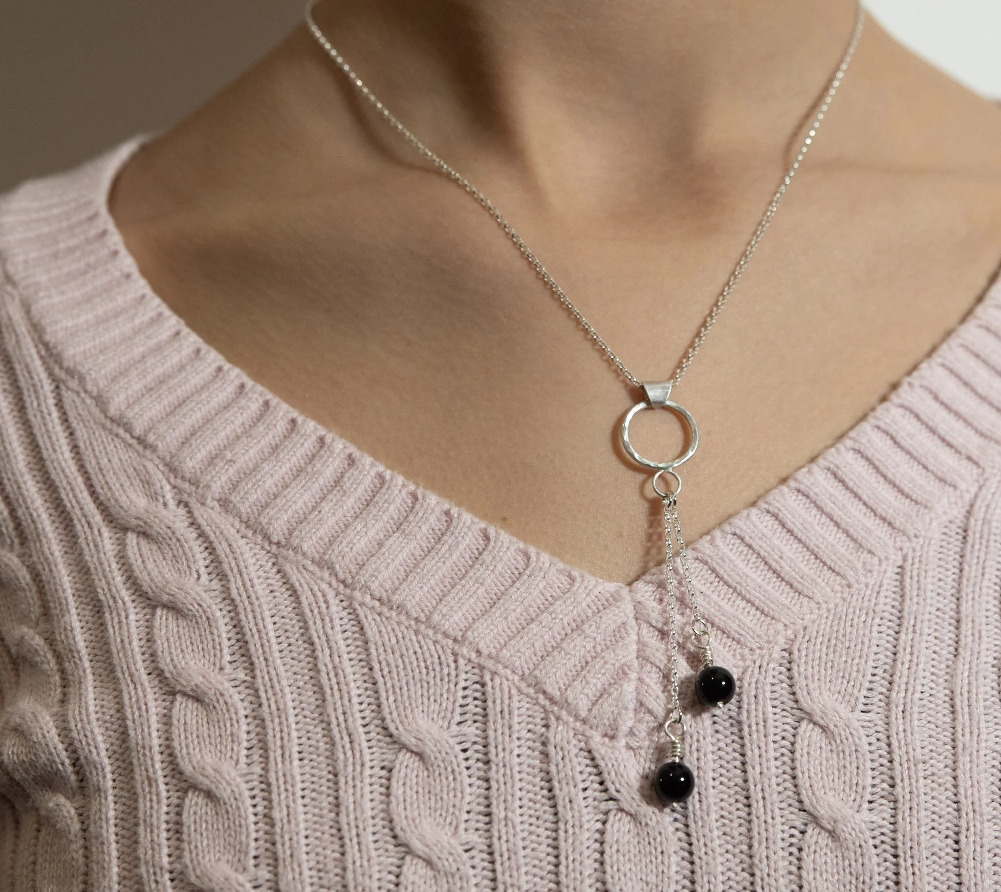 Silver "Pomona" necklace pendant, with black agate beads and hammer-texturing