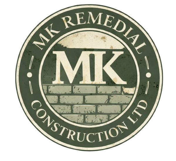A circular logo for MK Remedial Construction Ltd featuring the text 'MK REMEDIAL' at the top and 'CONSTRUCTION LTD' at the bottom, with a central design of a brick wall and the letters 'MK' on top.