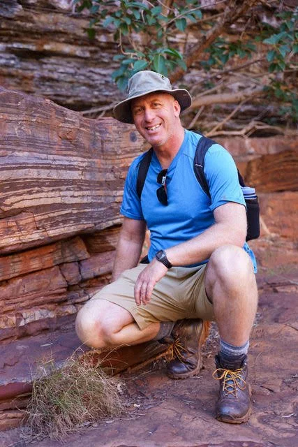Picture of Astrobiologist Jon Wlliis in front of an interesting rock formation