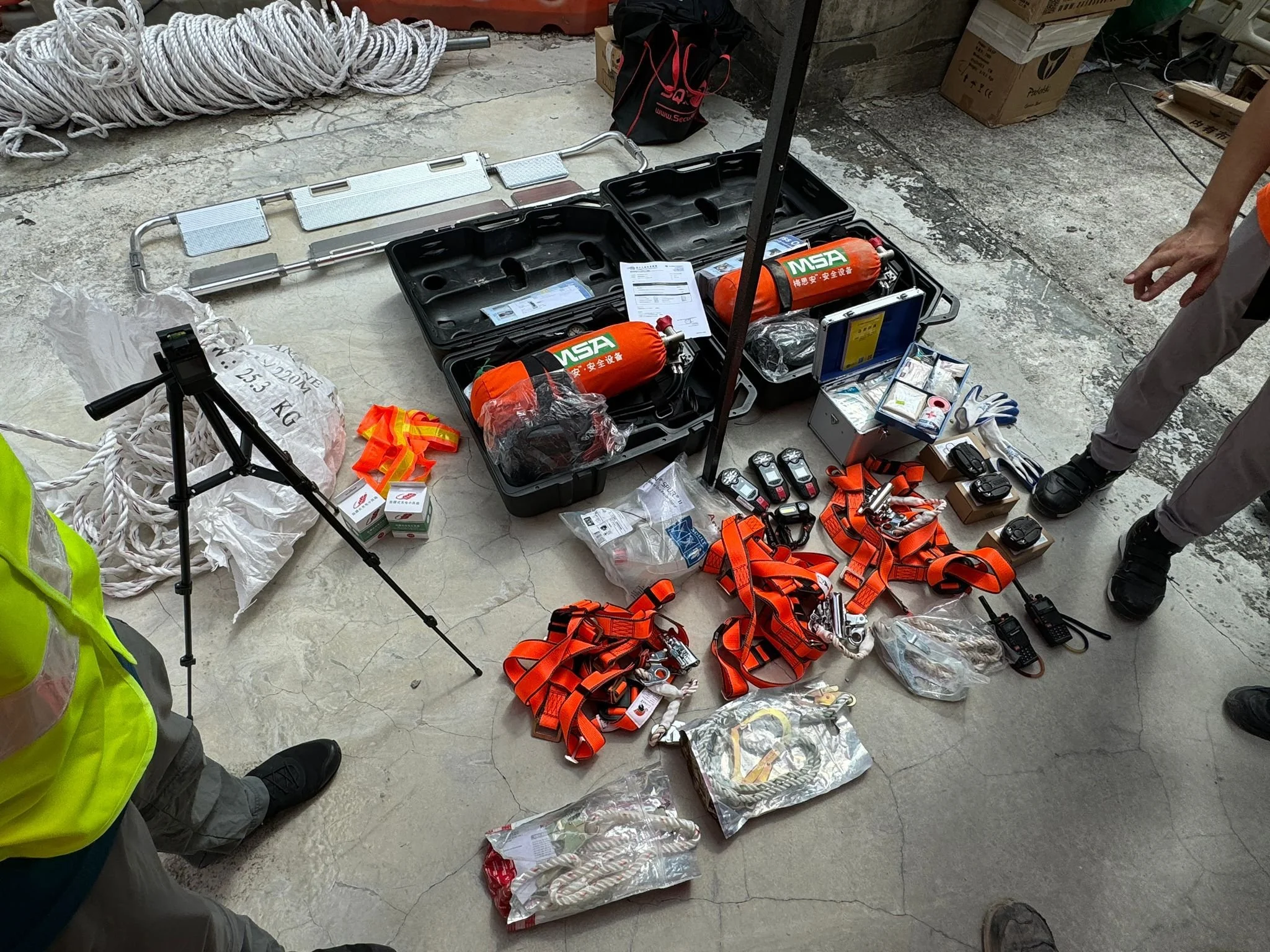 gas detectors, forced-air ventilation blowers, tripod rescue systems, fall protection, communication devices, and personal protective equipment (PPE) like masks and helmets