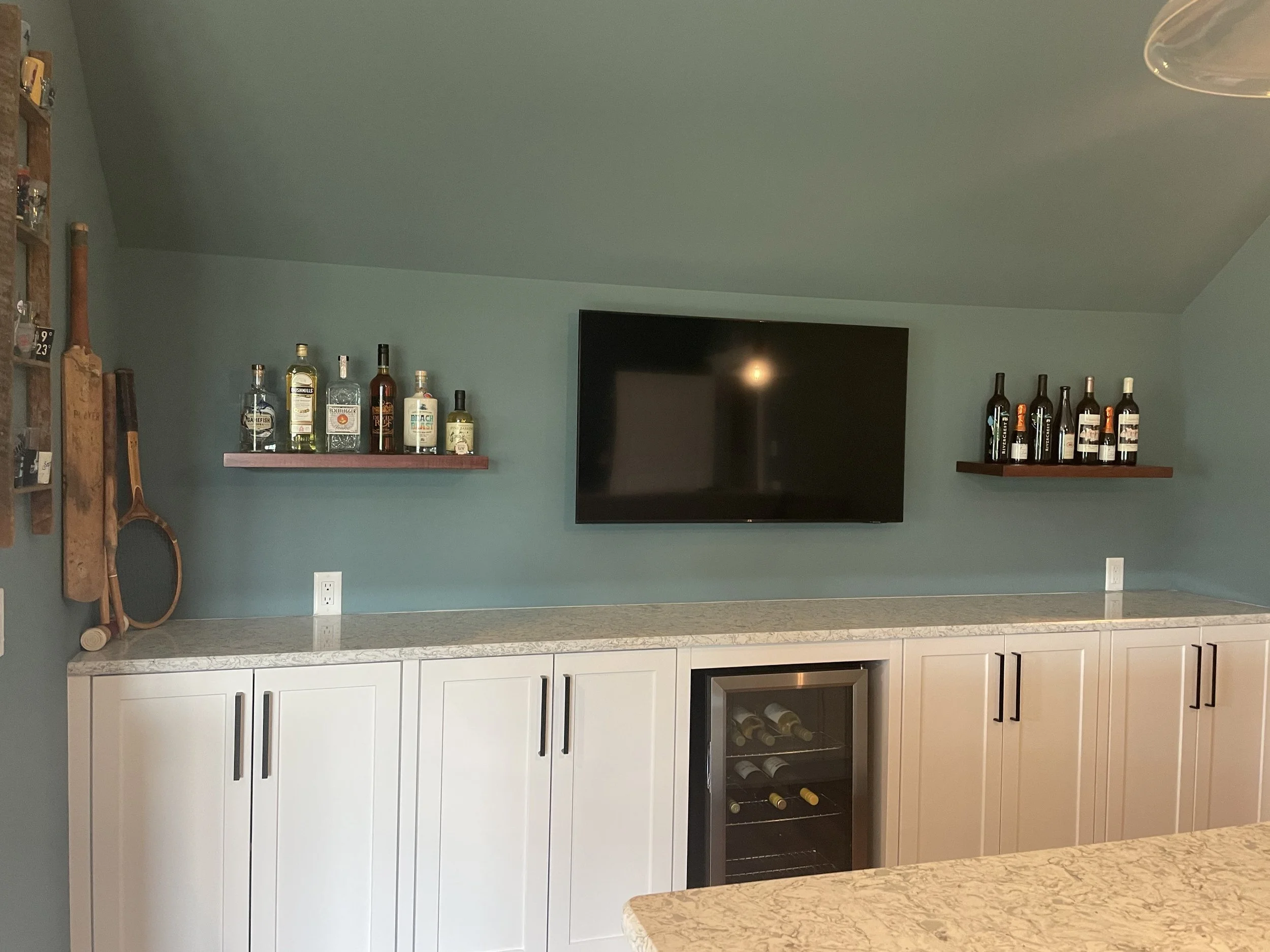 Custom shelves for bonus room kitchen