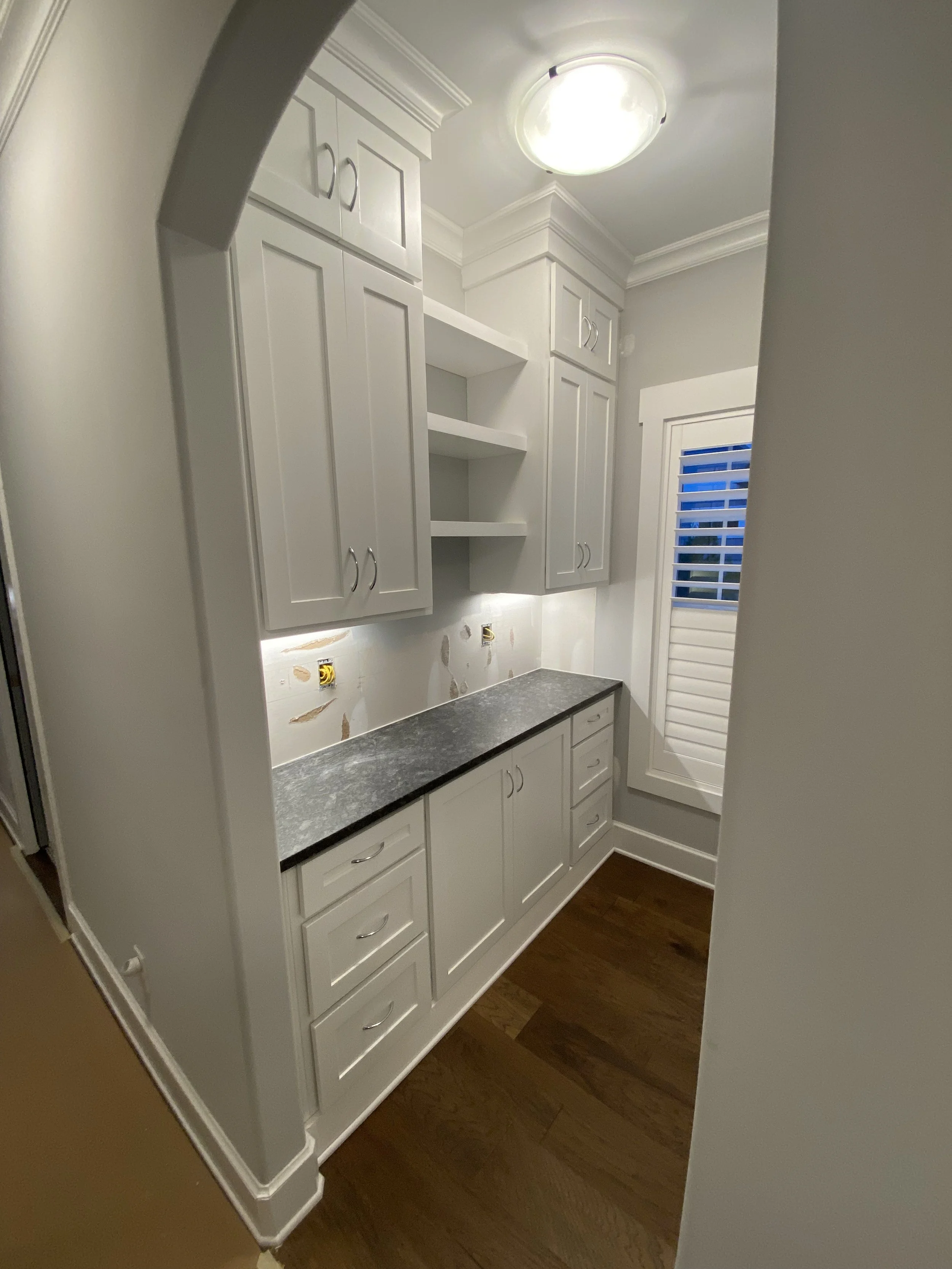 Custom built-ins for appliance nook.