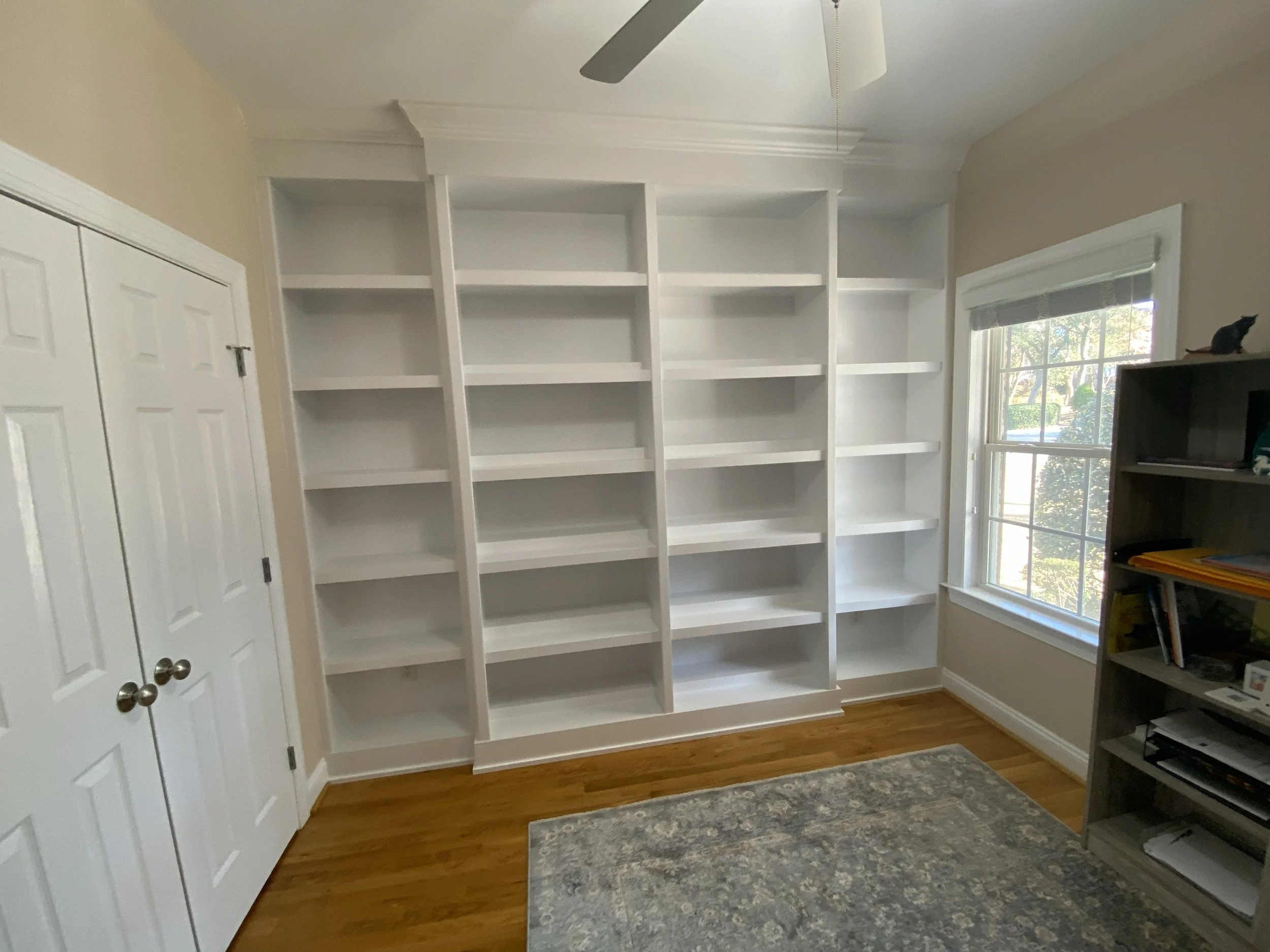 Custom double shelf bookcase built-ins for office