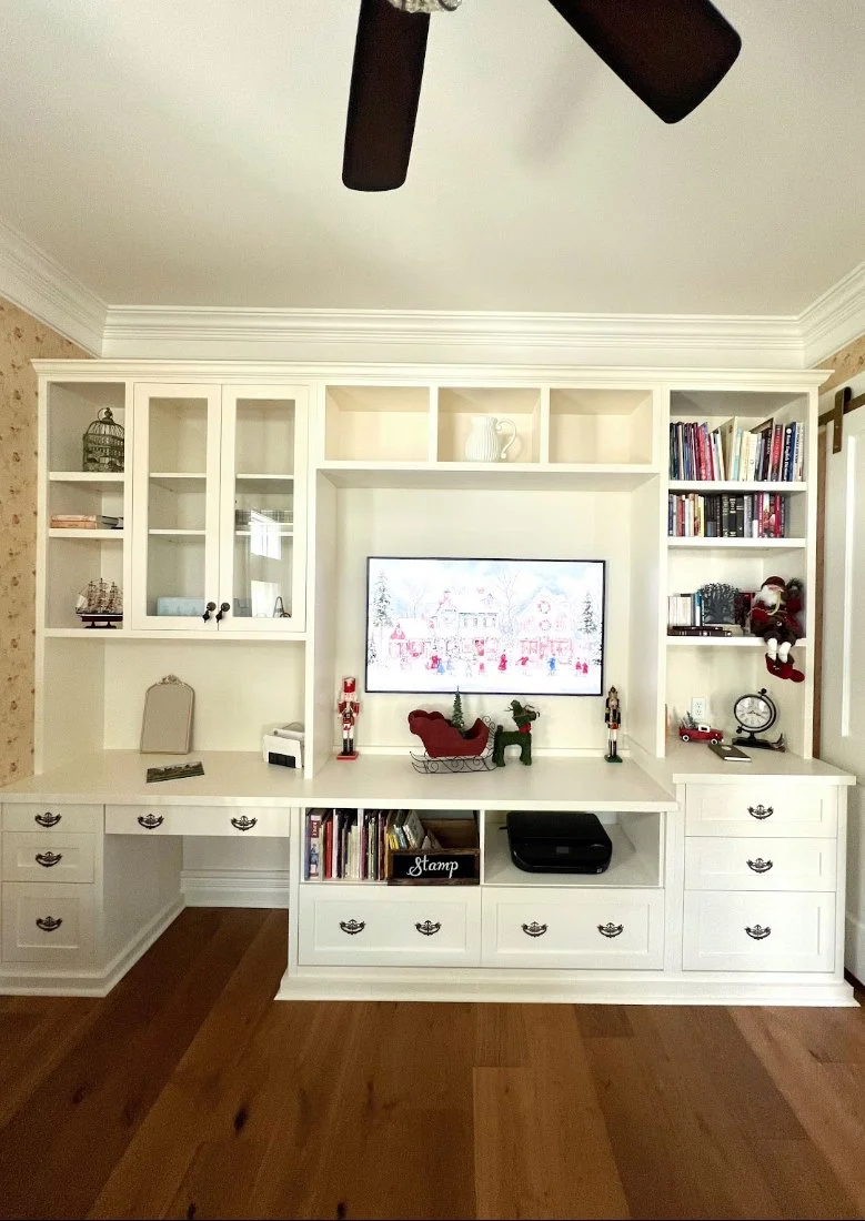 Custom office built-ins with desk area and TV space