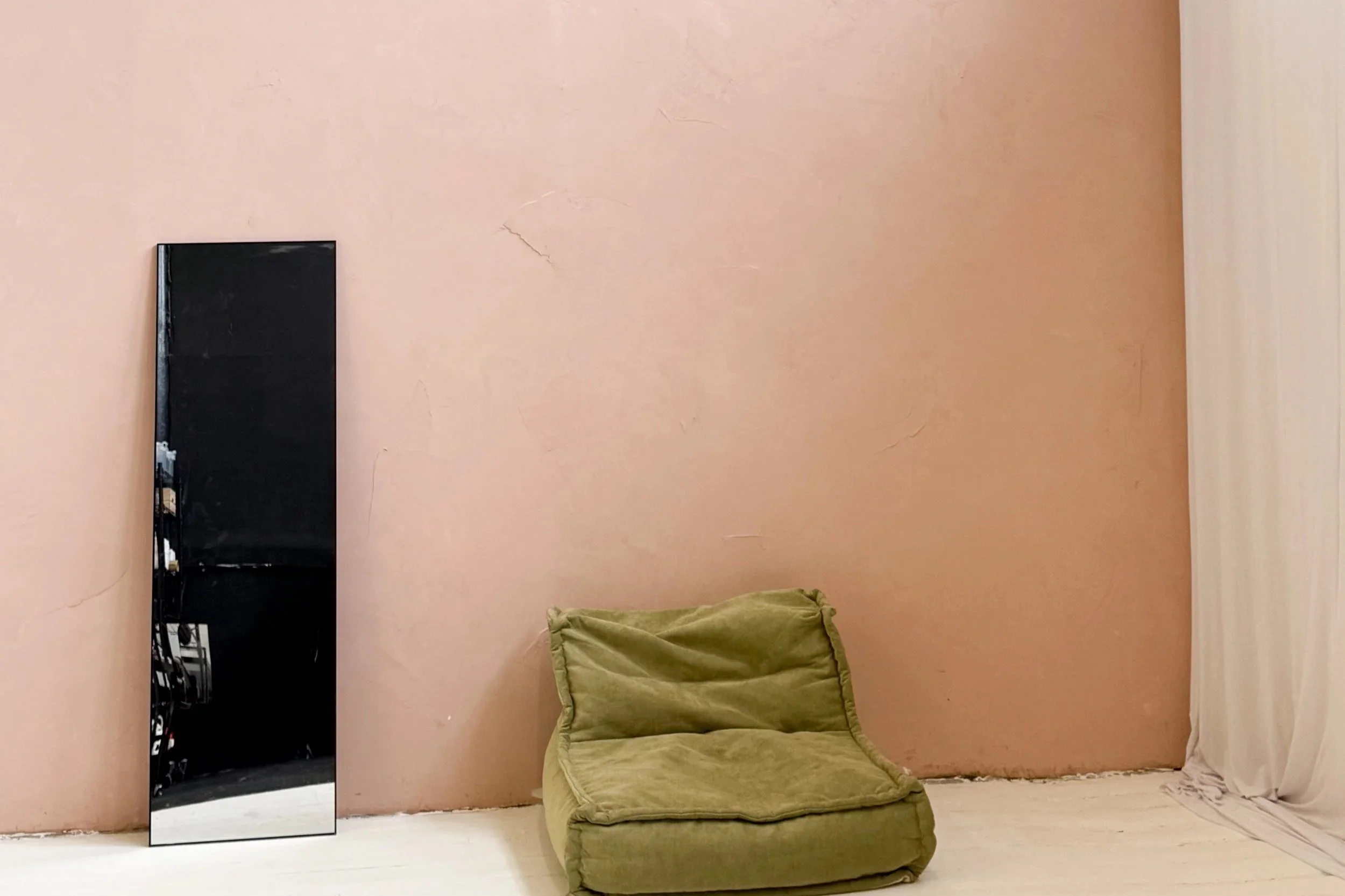 North Manchester photography studio with styled set and textured walls for branded content and creator shoots.