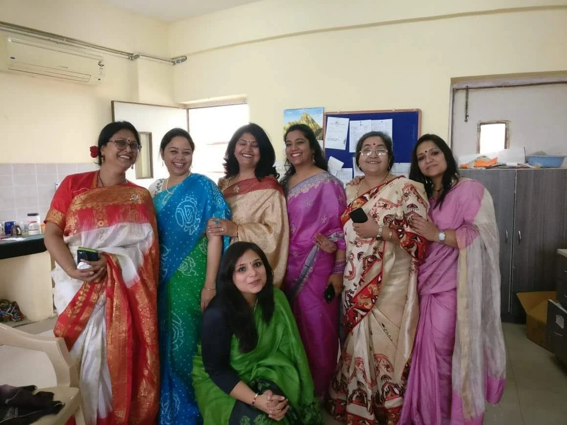 Shuchita Dua leading a mental health workshop with a group in a professional or institutional setting