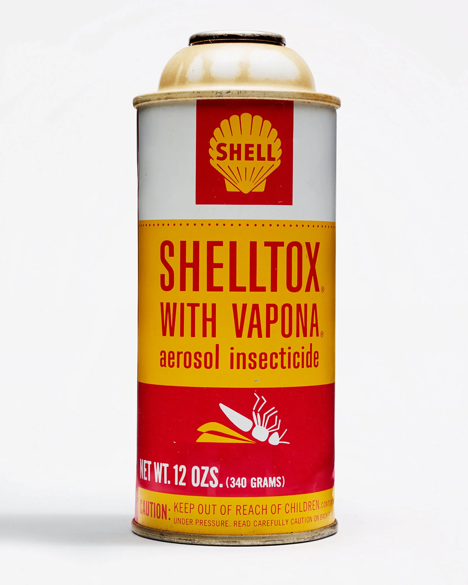 A vintage spray can of Shelltox with Vapona, labeled as an aerosol insecticide.
