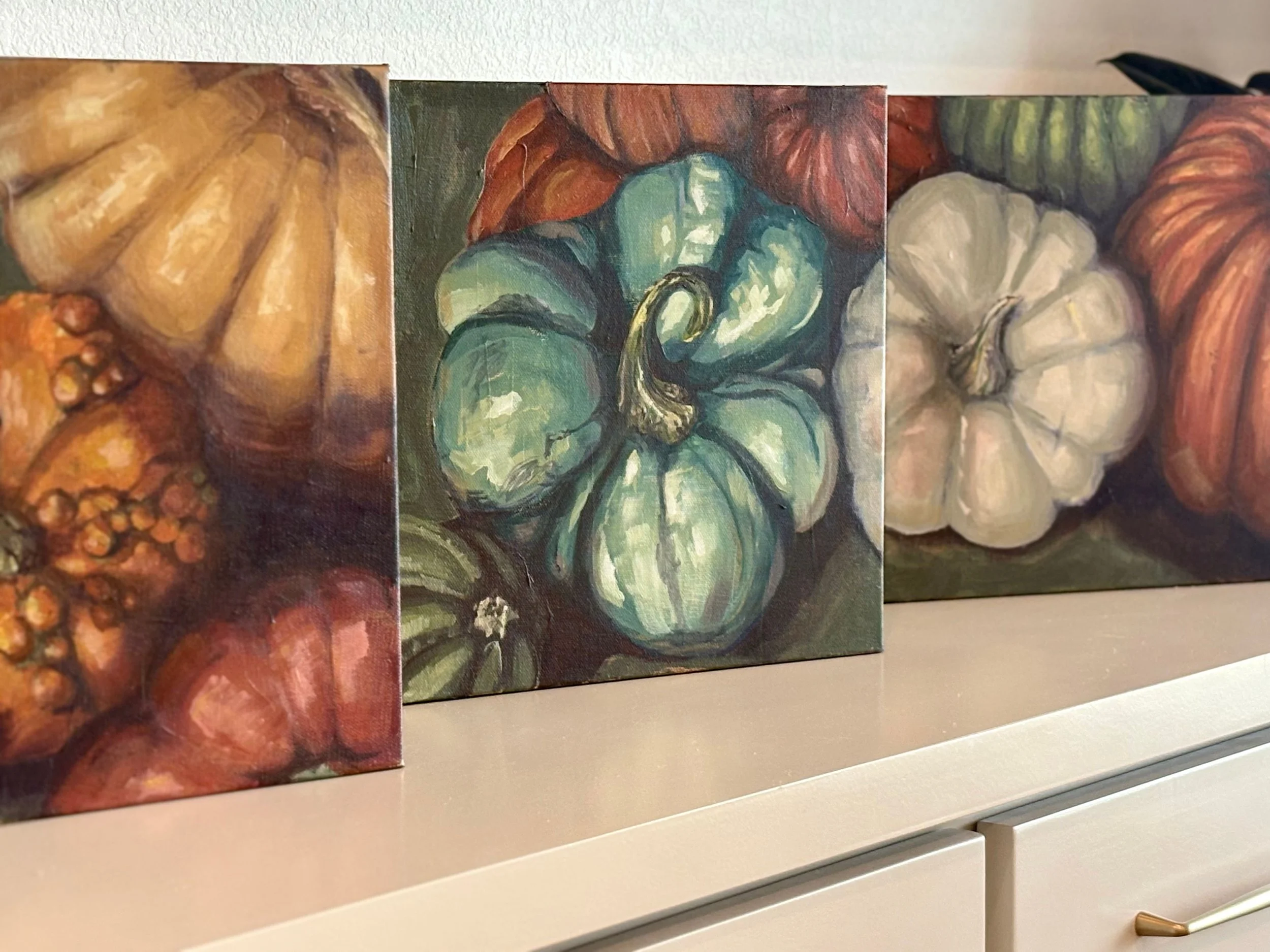 three pumpkins in a line.jpg