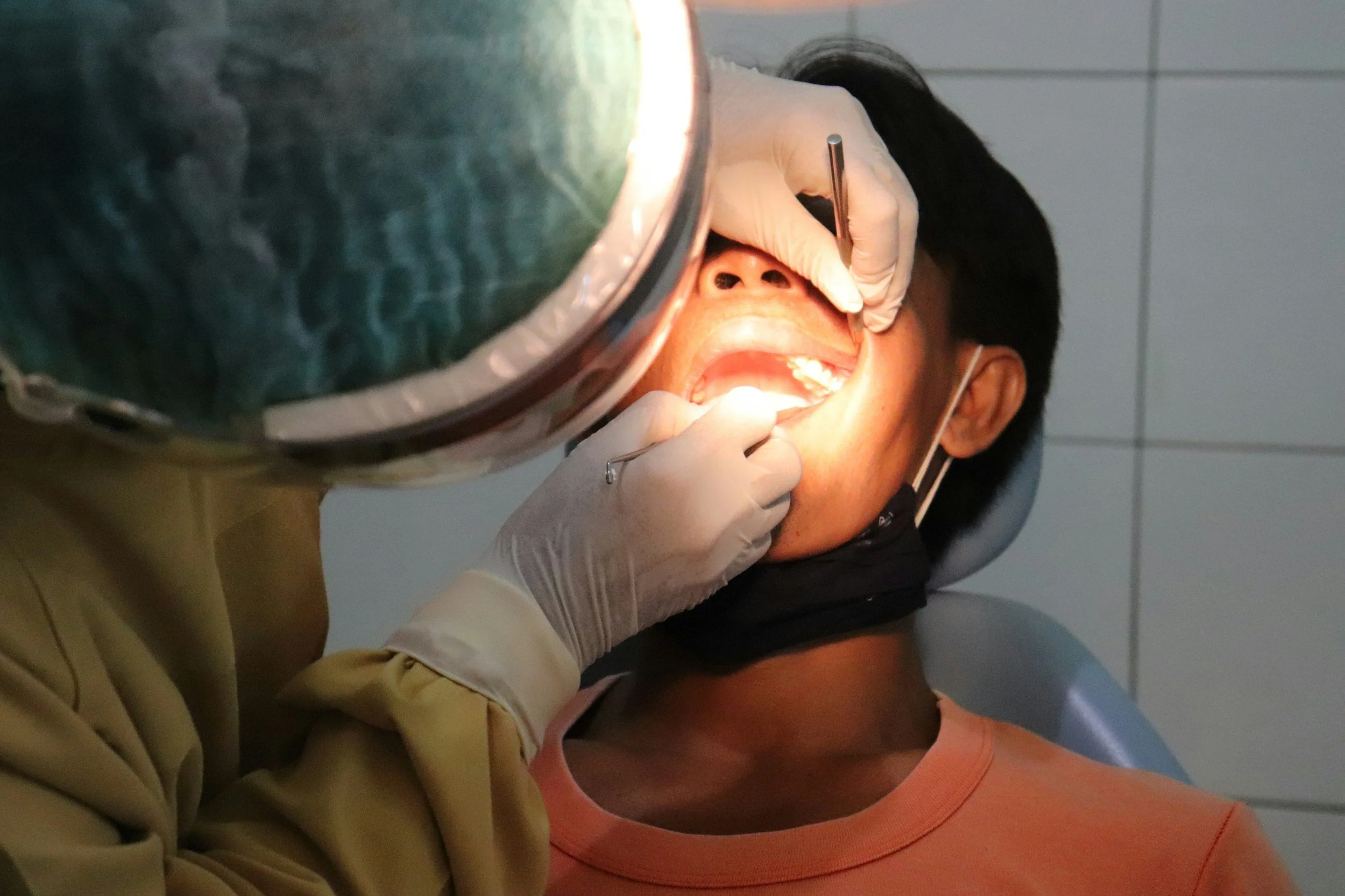 Tooth being extracted.