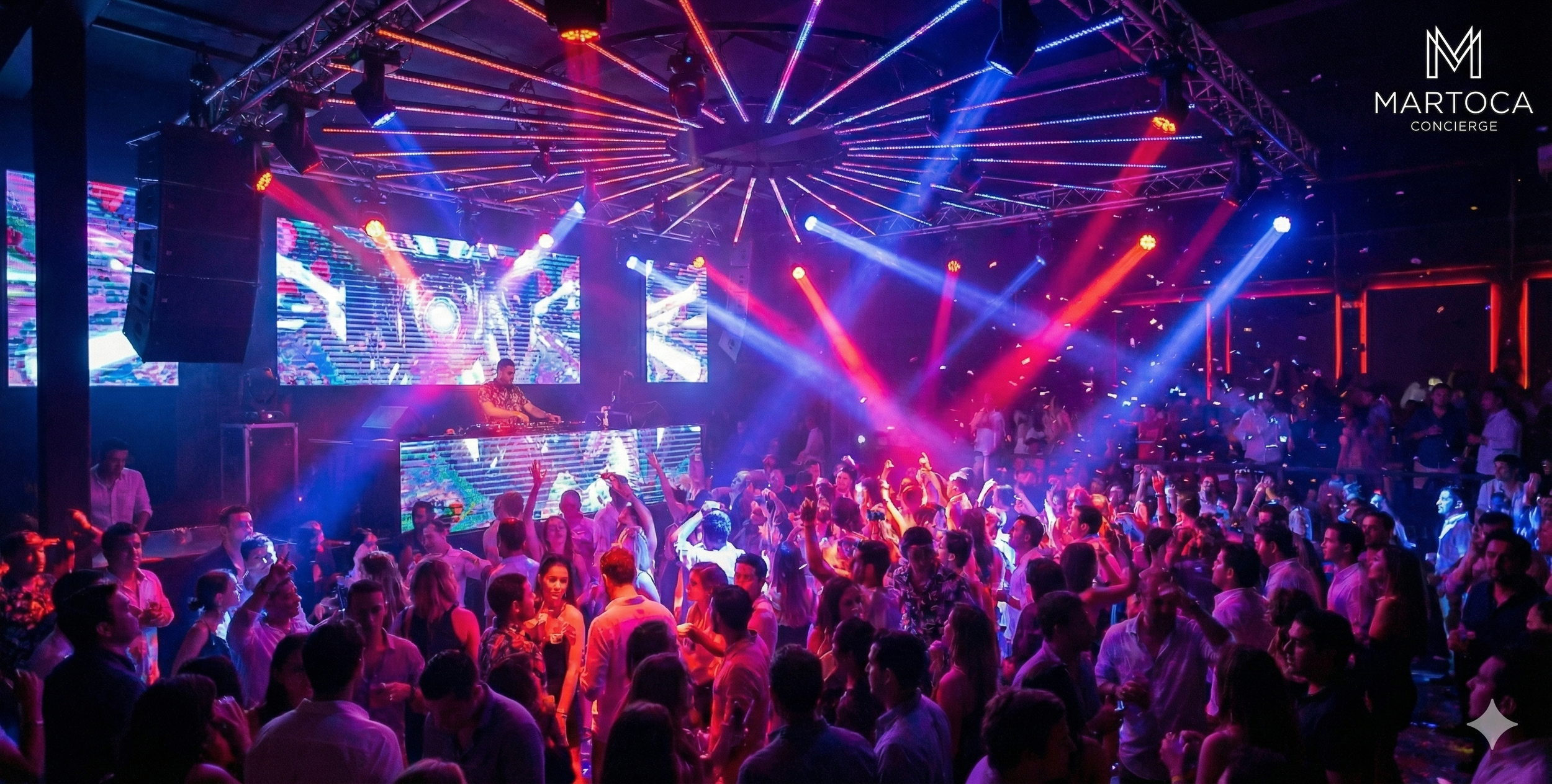 A crowded nightclub with colorful lights and laser beams illuminating the dance floor and crowd.