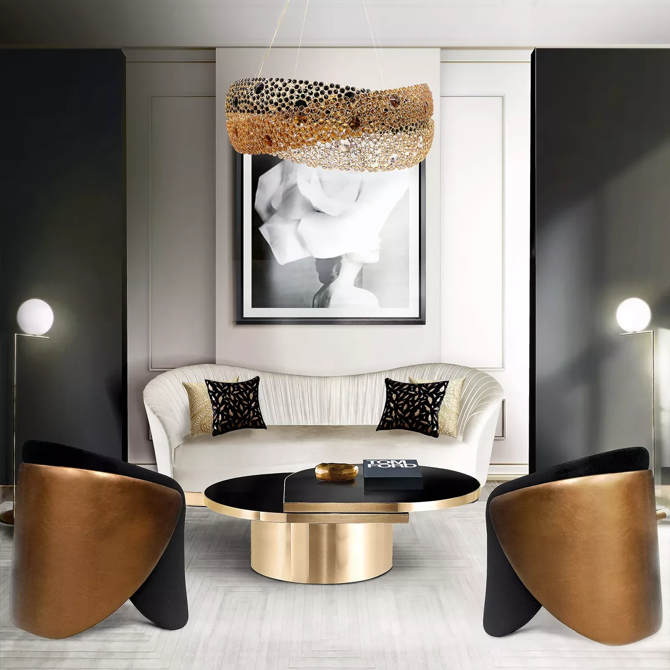 Modern living room with a white sofa, black and gold pillows, a black and gold coffee table, two bronze chairs, black wall panels, a large framed black and white abstract photo, and a gold bubble chandelier.