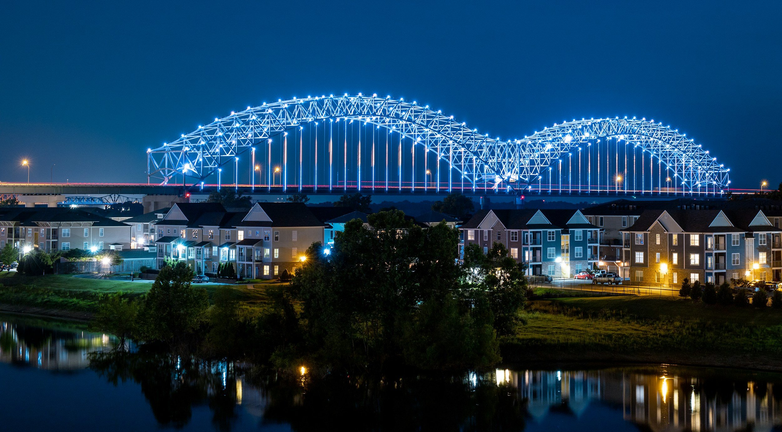 Memphis, Tennessee bridge lit up over the Mississippi river