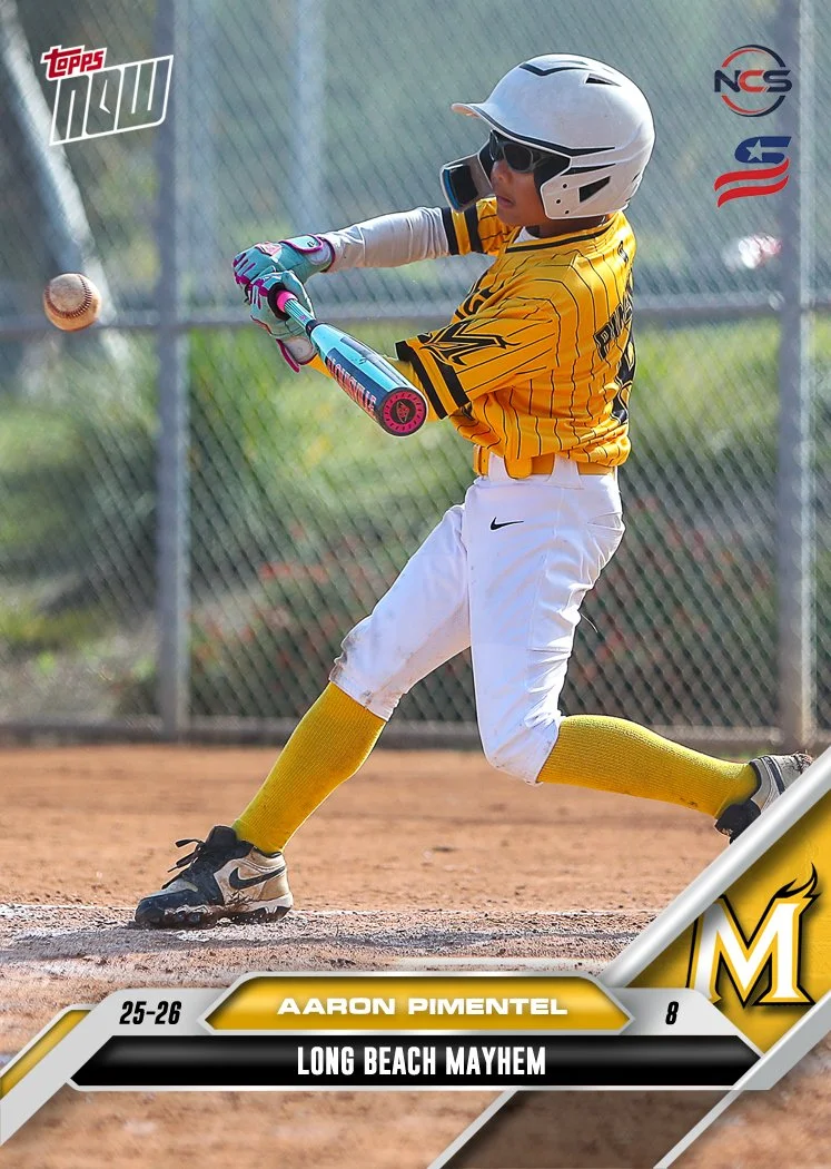 Young boy wearing a yellow baseball jersey with 'Mayhem' written on it, white pants, black cap with a small flame logo, sunglasses, and a yellow belt, standing against a plain white background.