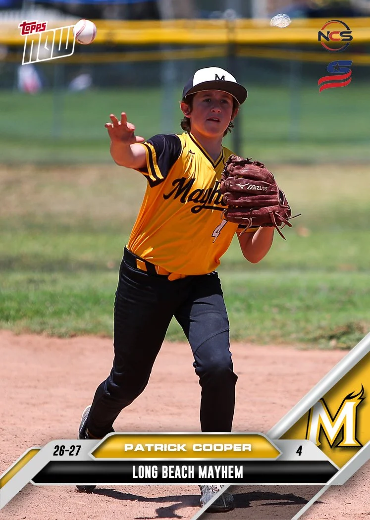 Young boy wearing a black and yellow baseball cap and a yellow Pinstripe baseball jersey with 'Nayhem' logo, standing against a white background.
