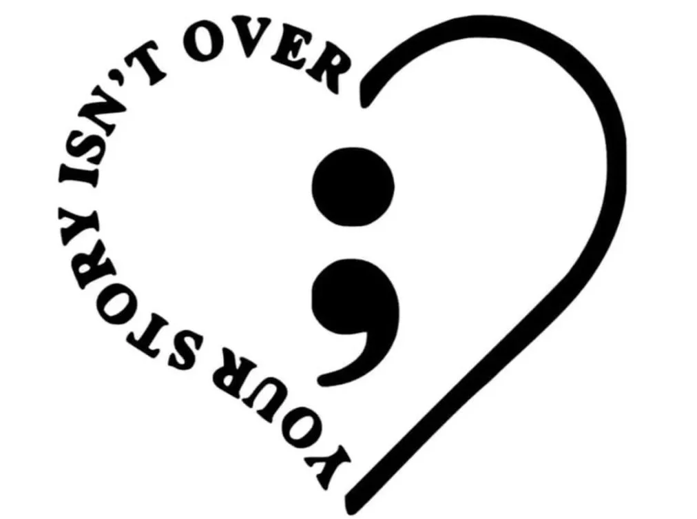 A heart-shaped design with text curved along its outer edge that reads "YOUR STORY ISN'T OVER" and a large comma in the center.