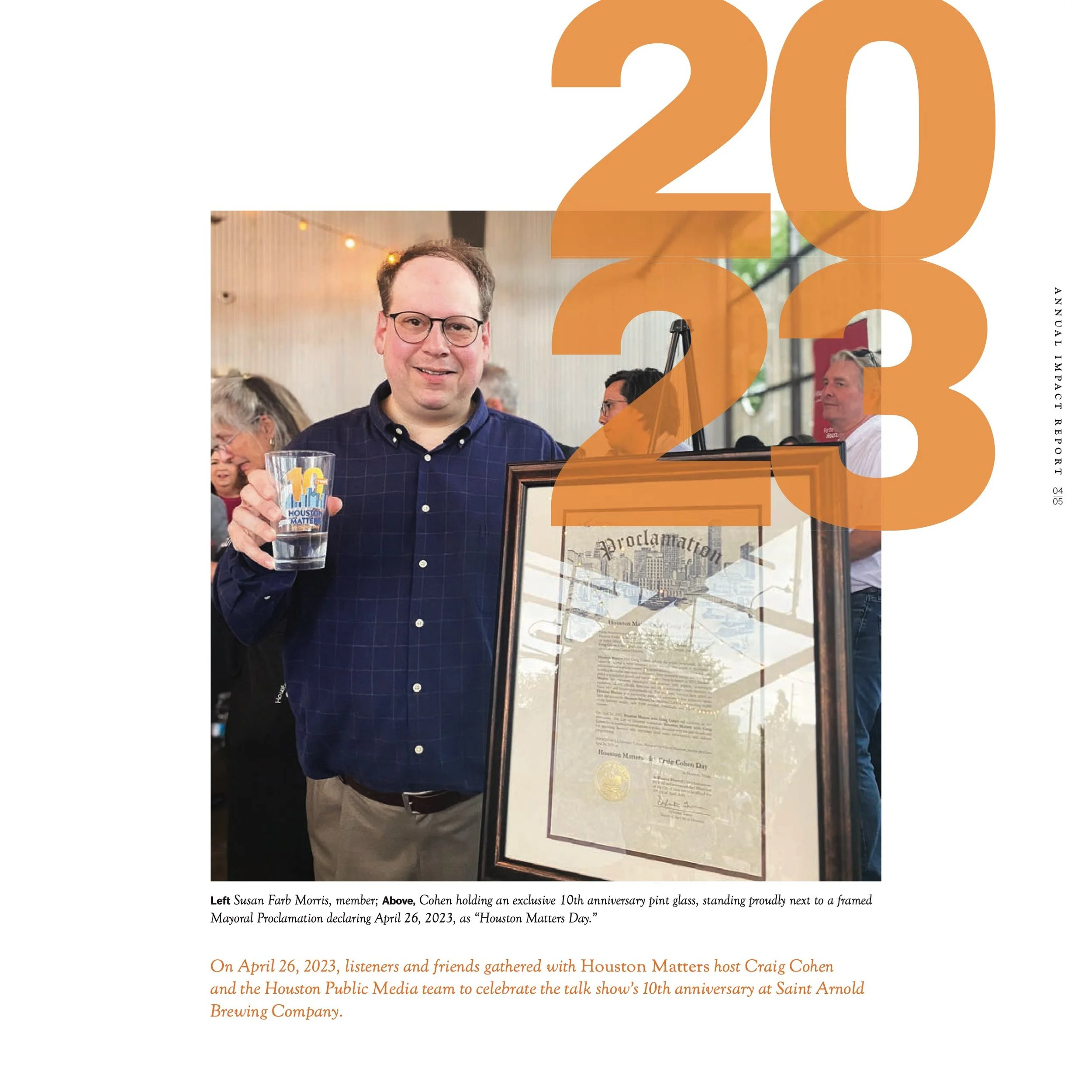Houston Matters host Craig Cohen holds an anniversary pint glass beside a framed mayoral proclamation declaring April 26, 2023 "Houston Matters Day," photographed at Saint Arnold Brewing Company.