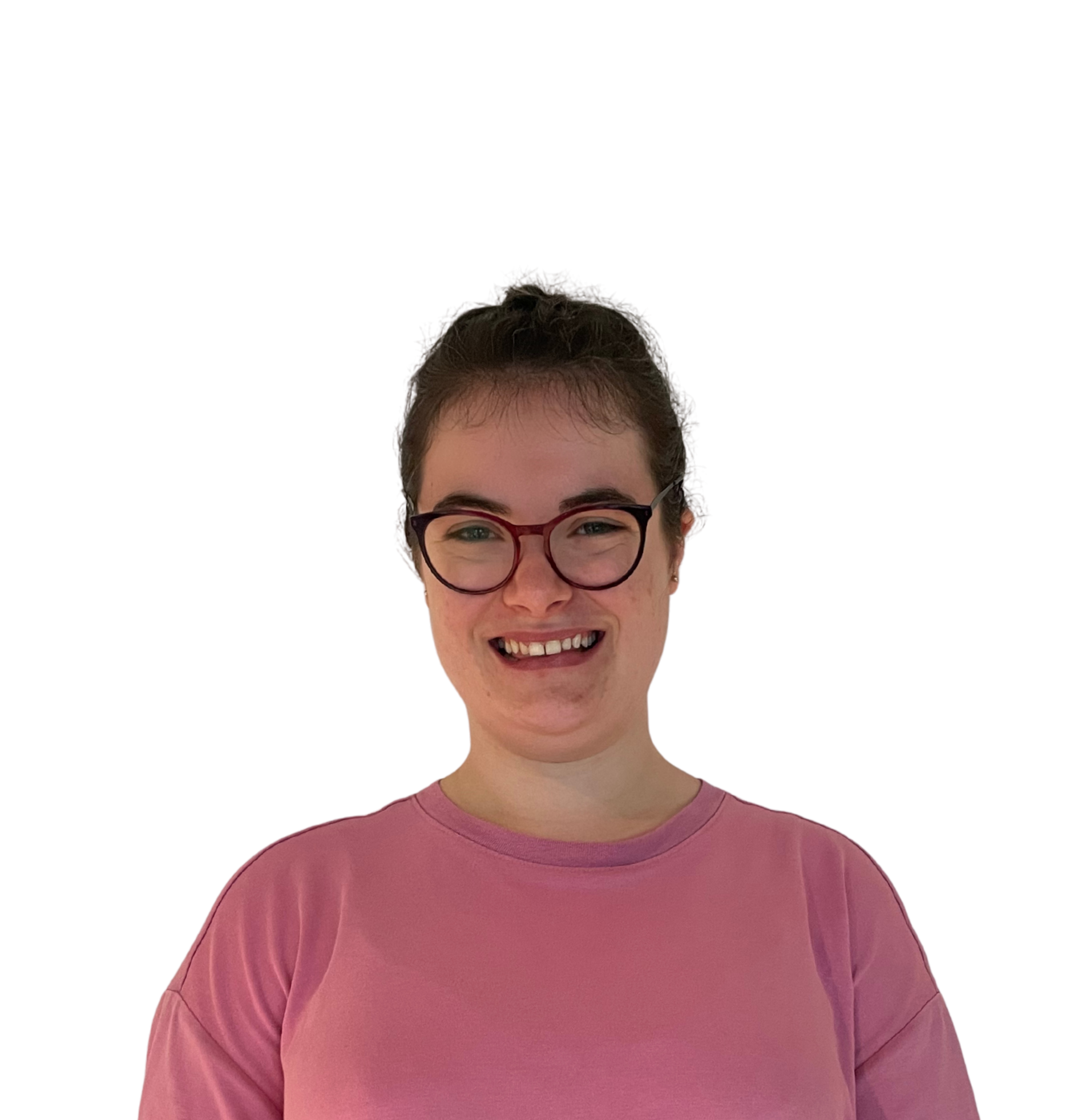 A smiling young woman with glasses, wearing a pink shirt, against a plain background.