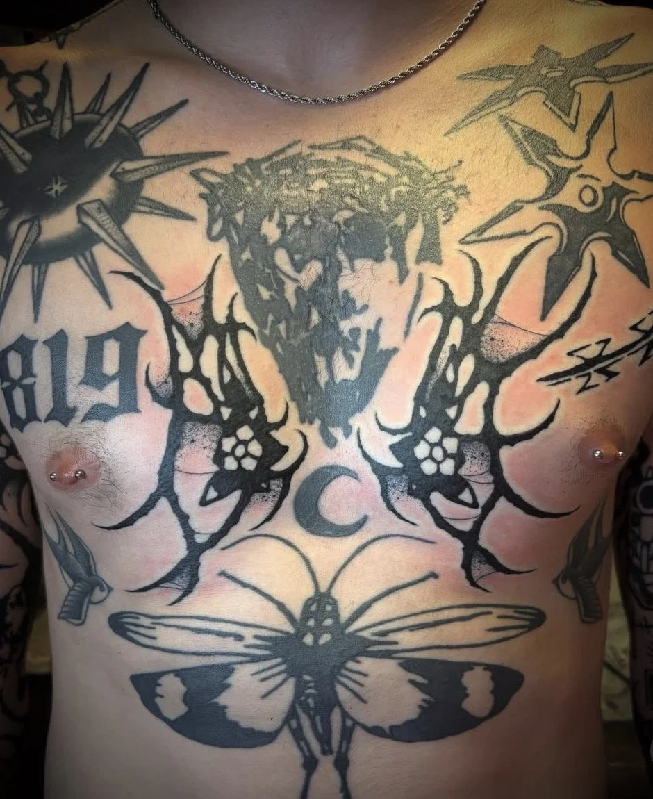 Kyle Grand @kylexgrand large scale black work tattoo on the chest done at Dame of the West Tattoo in Scottsdale, Arizona.jpeg