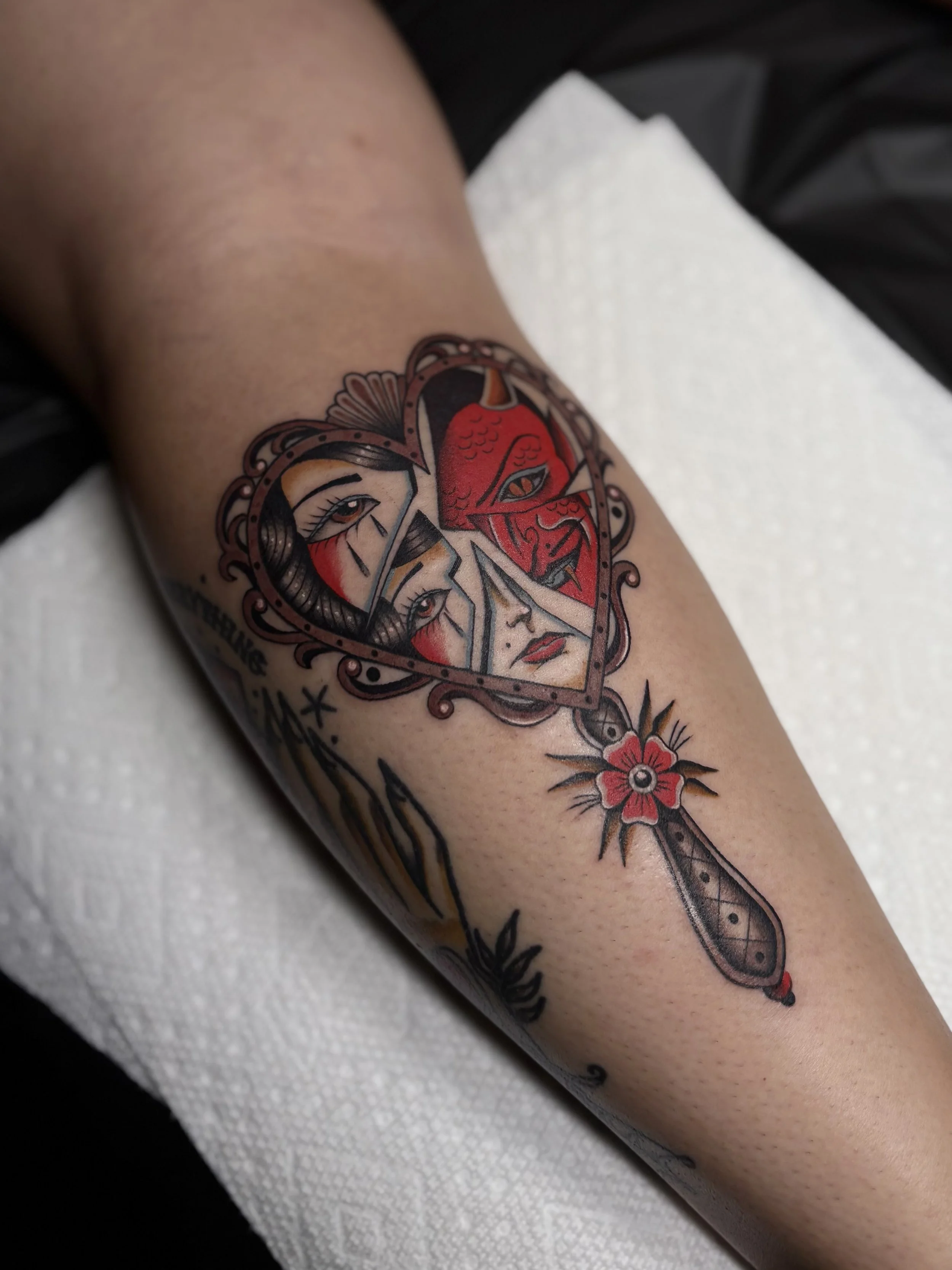 Suzie Q, @suzieqtattoos Traditional style broken mirror tattoo on the leg at Dame of the West Tattoo in Scottsdale, Arizona