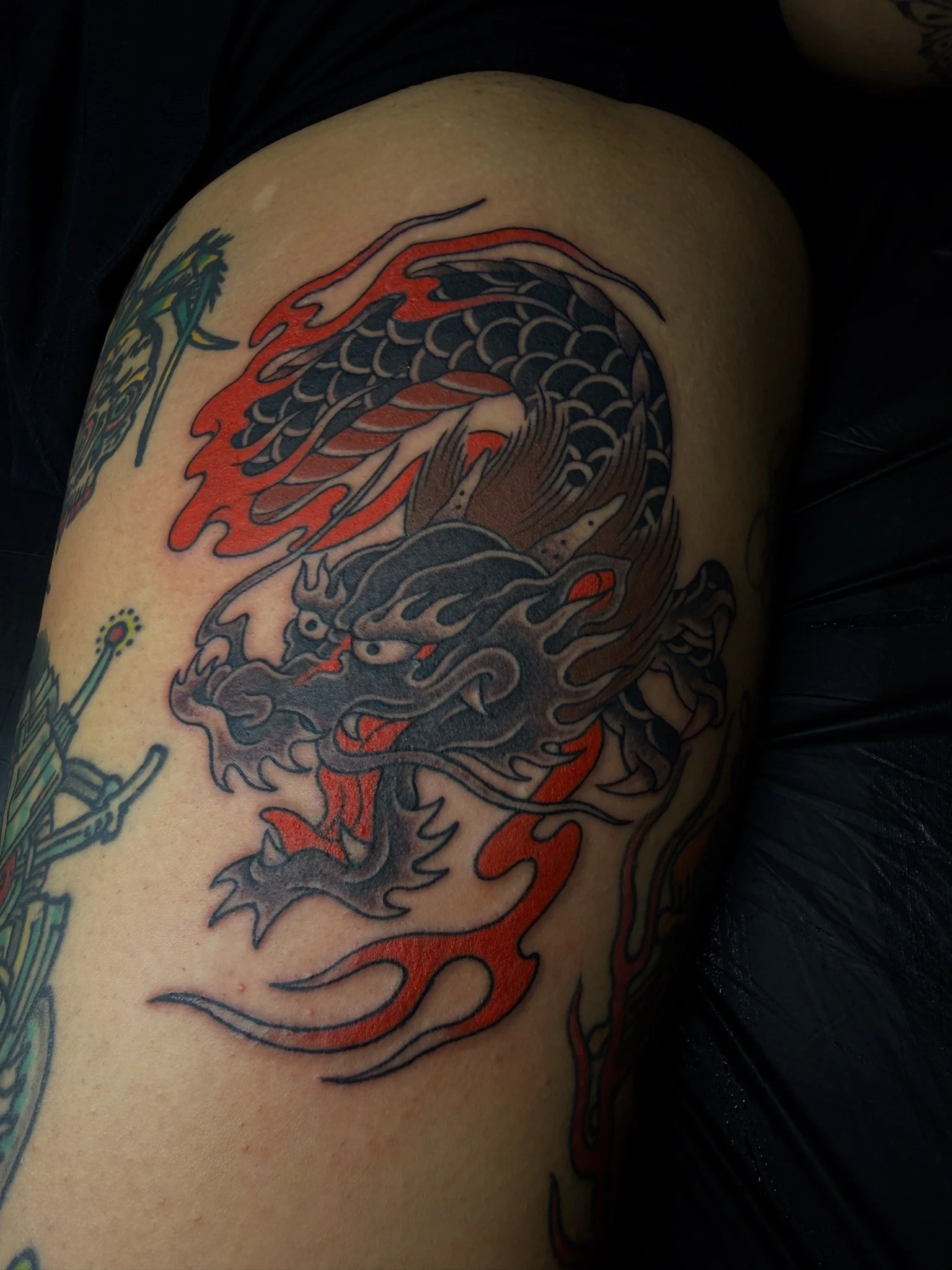 Josh Carter, @joshcartertattoo Traditional Japanese Dragon Thigh Tattoo done at Dame of the West Tattoo in Scottsdale, Arizona.