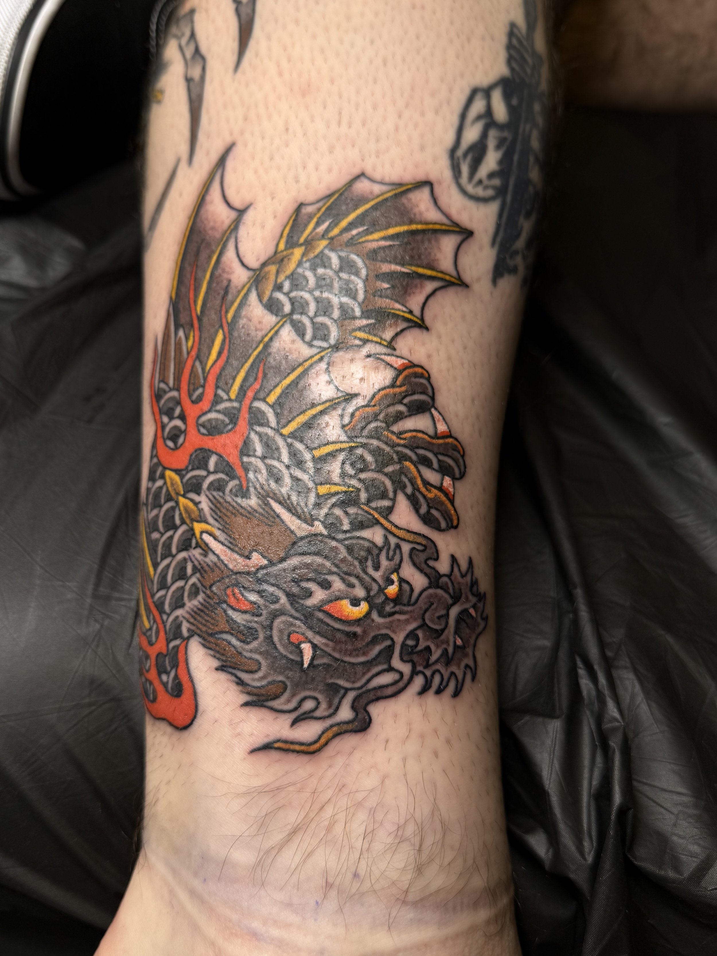 Josh Carter, @joshcartertattoo Traditional Japanese Dragon Leg Tattoo done at Dame of the West Tattoo in Scottsdale, Arizona.