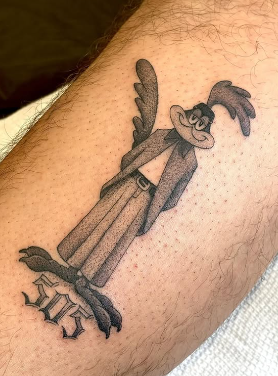Chris Naderer Fine Line Black and Gray cartoon tattoo on the arm tattooed at Dame of the West Tattoo in Scottsdale, Arizona