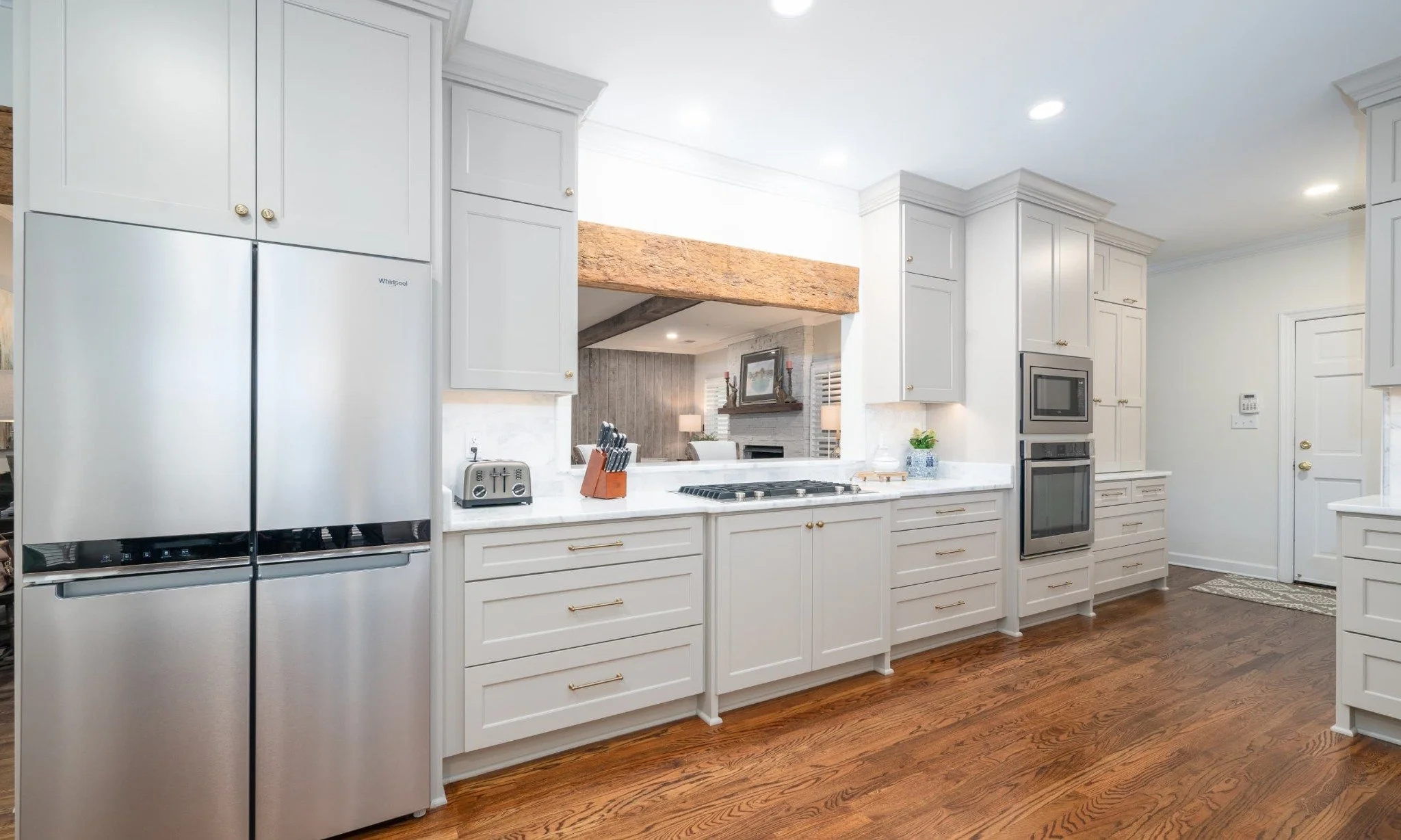 White Galley Kitchen with Wood Accents