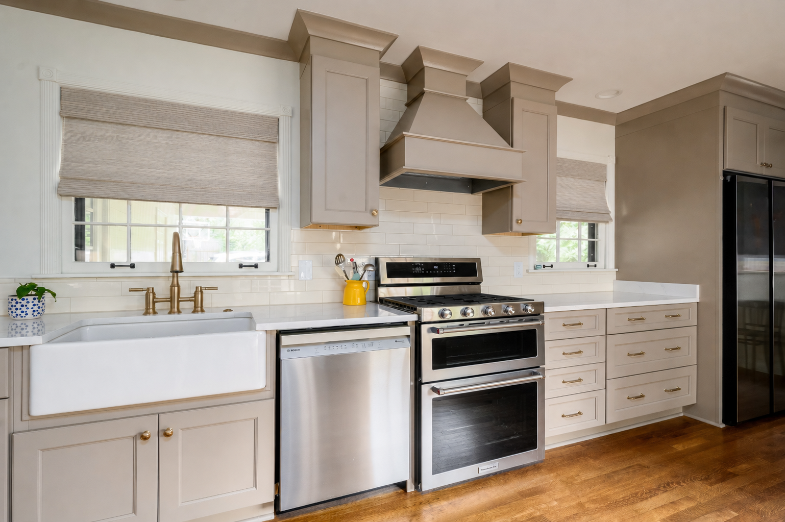 Taupe Kitchen with Farmhouse Sink and Range