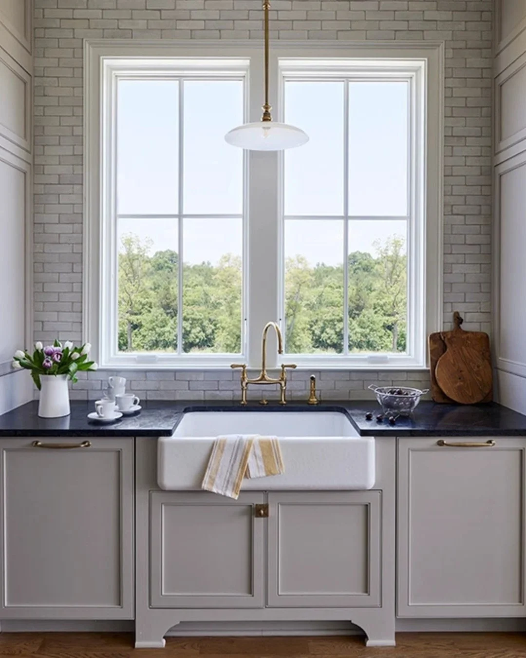 Large replacement kitchen windows above a farmhouse sink installed by Robbins Construction in Memphis and Germantown, TN.