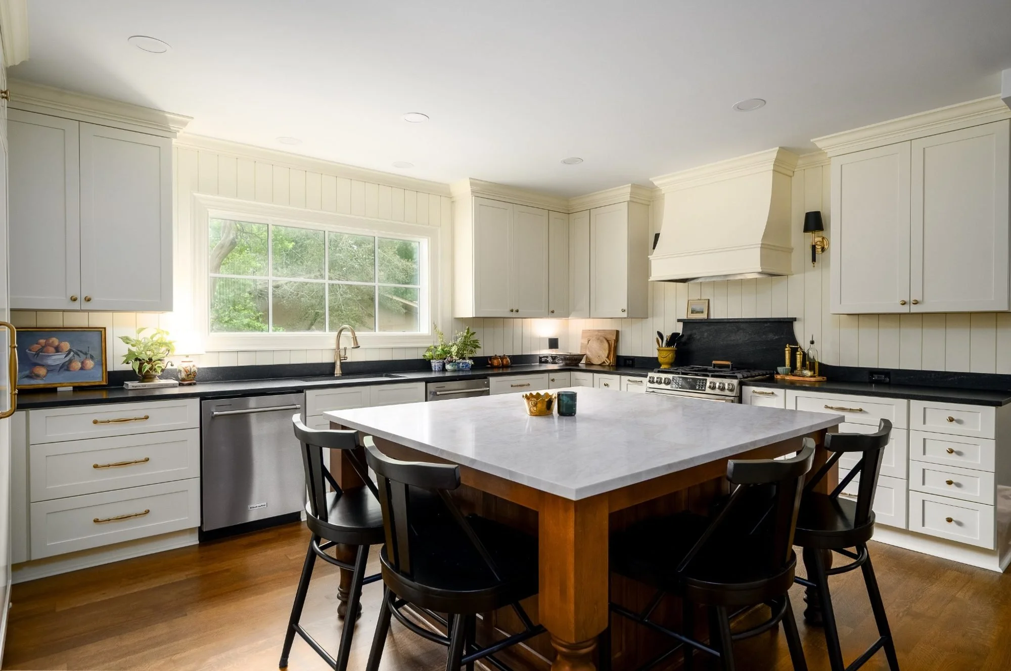 Custom kitchen remodel in Grove Park Germantown TN featuring furniture-style island and creamy cabinetry