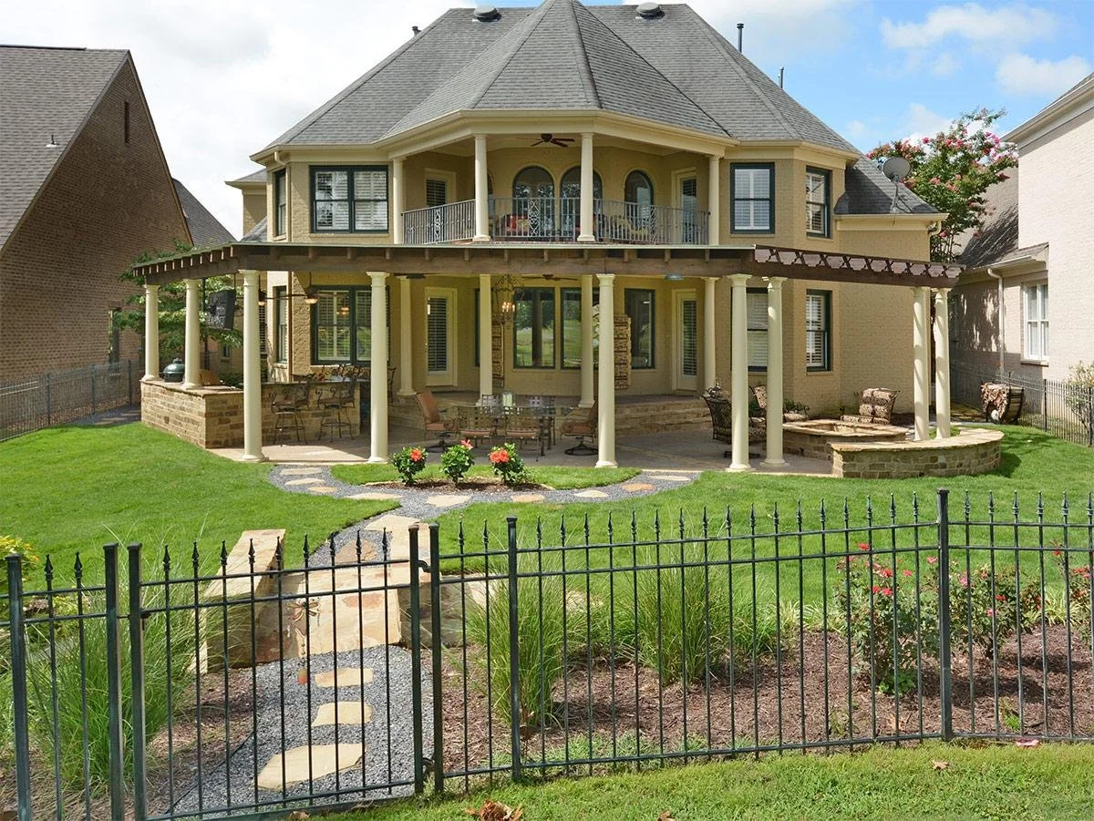 Thoughtful landscaping and open views create a serene backdrop for this outdoor retreat.