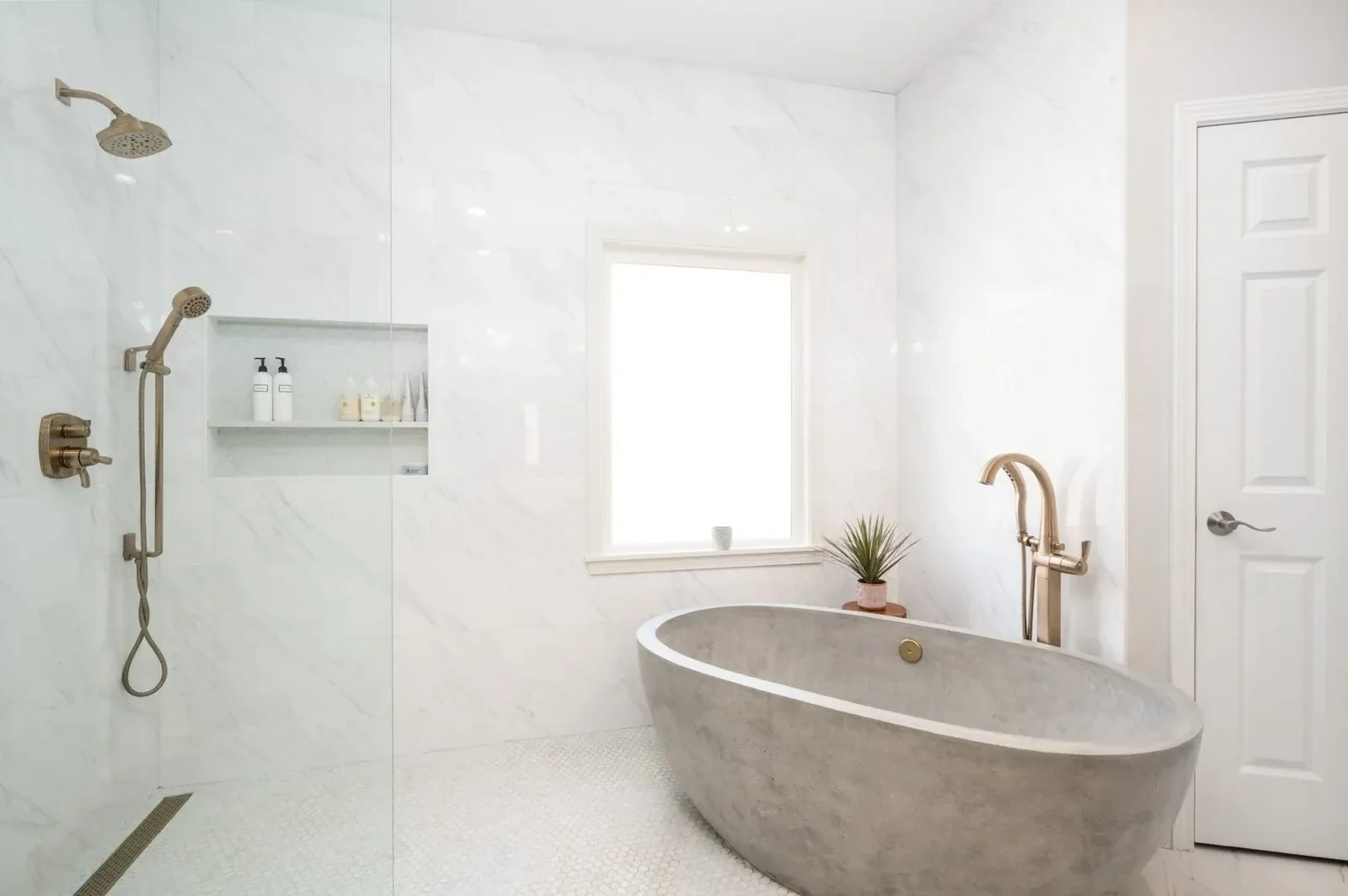 Germantown bathroom wet room featuring a freestanding soaking tub, wall-mounted tub filler and open shower.