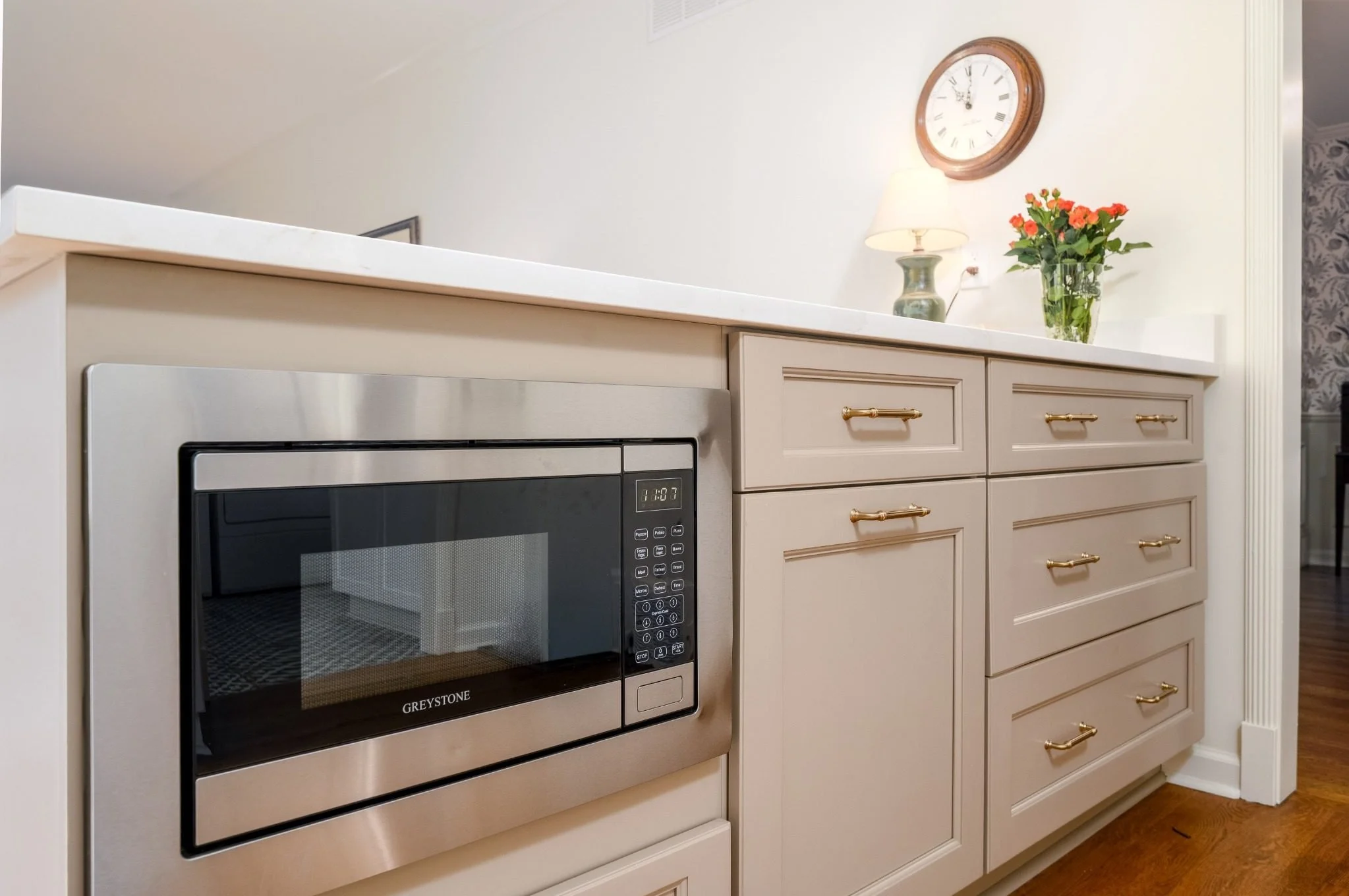 Built-In Microwave and Taupe Cabinetry